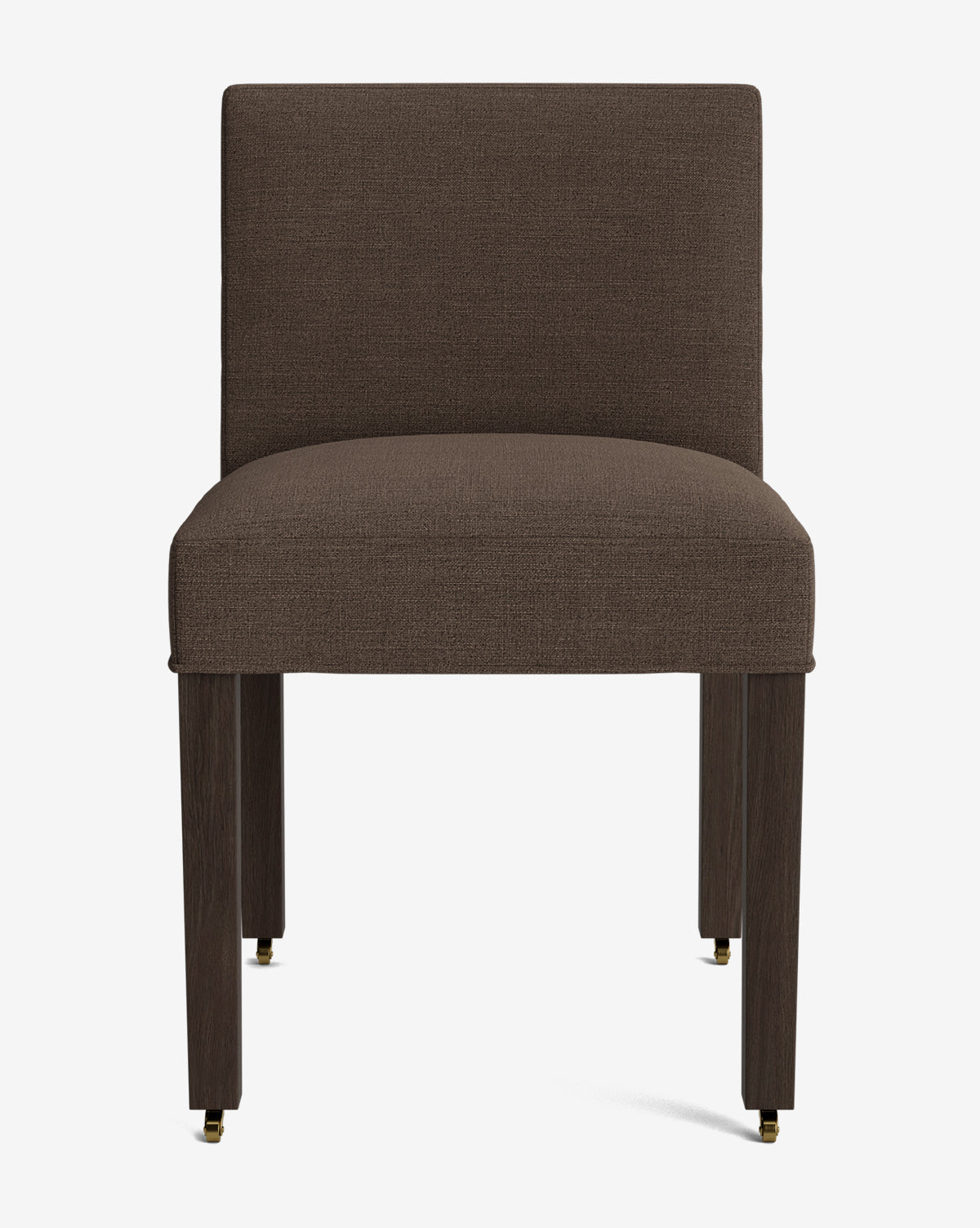 The Olivier Upholstered Dining Chair is a modern, armless dining chair in brown fabric with four straight wooden legs and small brass caster wheels on the front legs, displayed against a plain white background by McGee & Co.