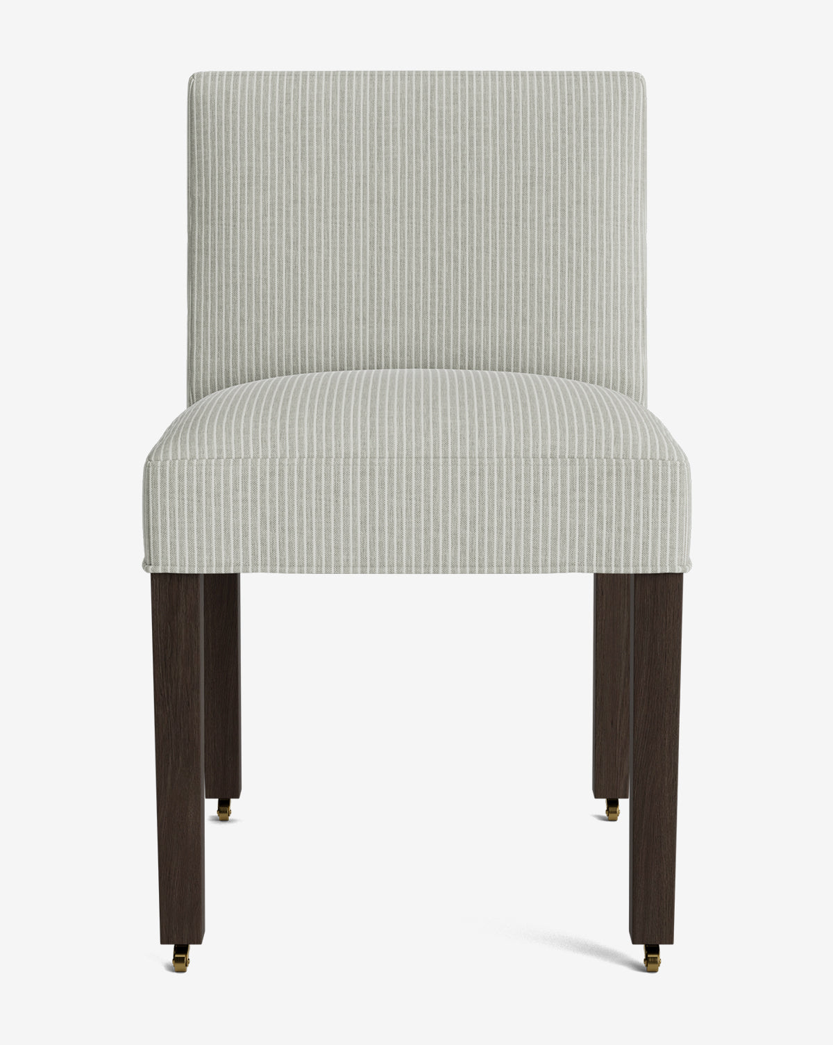 The Olivier Upholstered Dining Chair features a front view with light gray and white vertical striped high-quality fabric, dark wooden legs, and small brass caster wheels on the front legs, by McGee & Co.