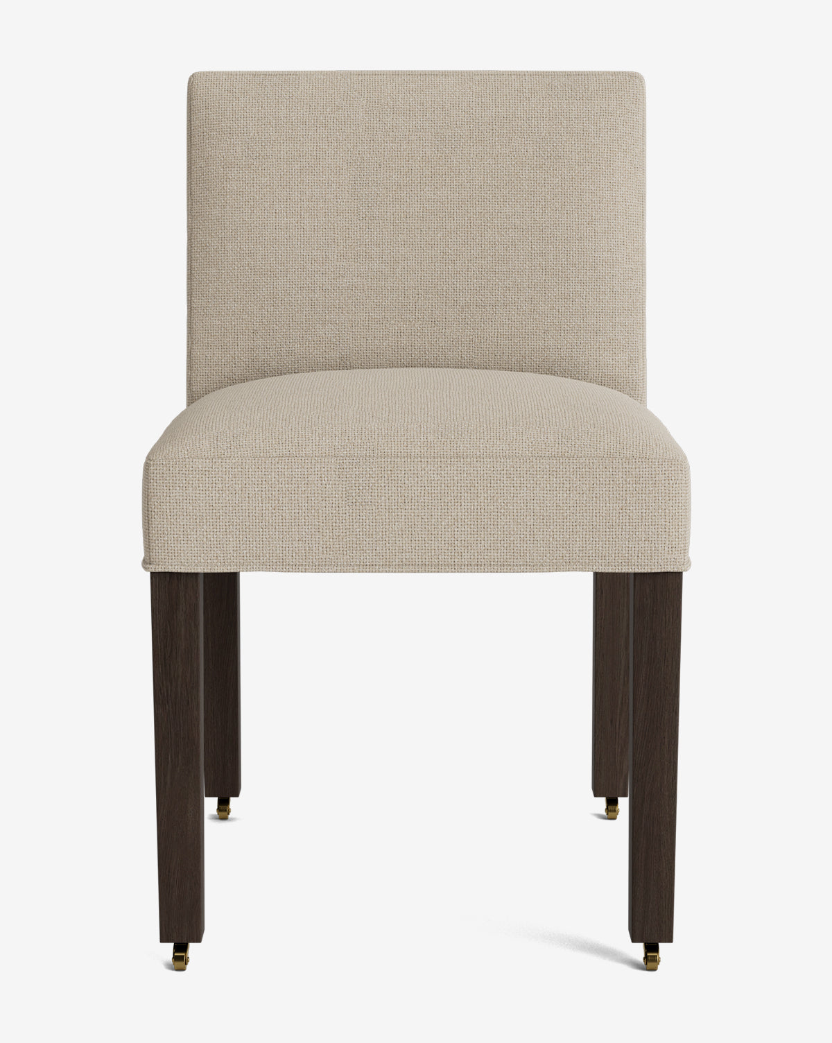 Front view of the Olivier Upholstered Dining Chair featuring a light beige high-quality fabric seat and backrest, straight dark wooden legs, and small brass casters on each leg, by McGee & Co.