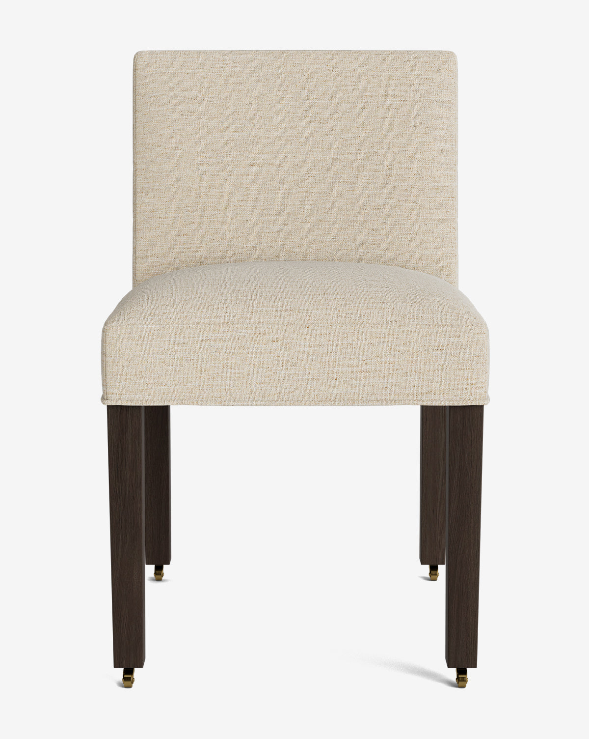 The Olivier Upholstered Dining Chair features a modern design with a light beige fabric seat and backrest, four dark wooden legs with brass metal caps, and is shown against a plain white background by McGee & Co.