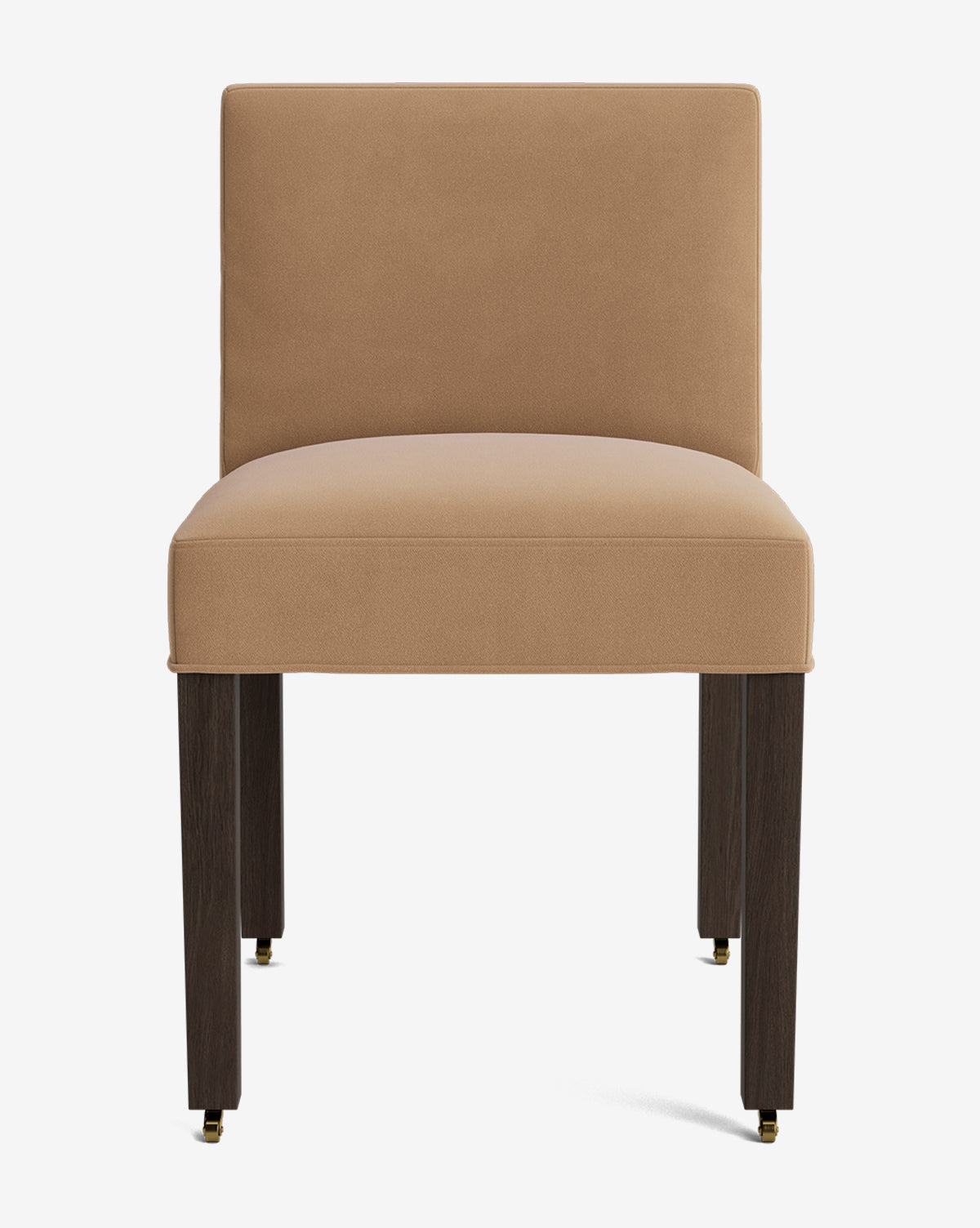The Olivier Upholstered Dining Chair features a tan high-quality fabric seat and backrest, four straight dark wooden legs, and brass casters on the front legs, shown against a plain white background, by McGee & Co.