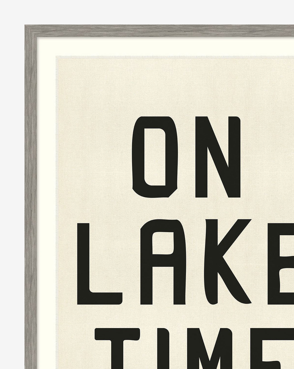 A framed sign called On Lake Time features bold black letters on a cream background, styled like a vintage camp flag.