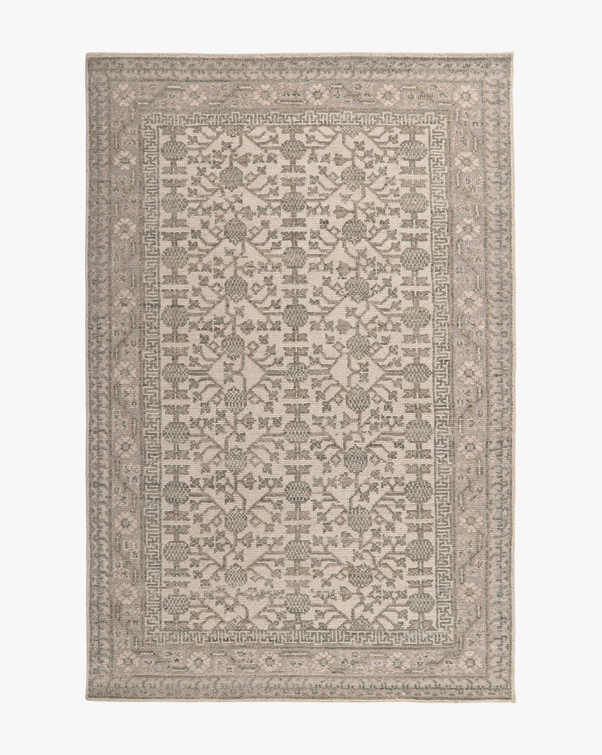 The Orsino Hand-Knotted Rug is a rectangular piece with an intricate, symmetrical floral and geometric pattern in neutral beige, gray, and taupe shades, finished with a detailed border framing the central design by McGee & Co.