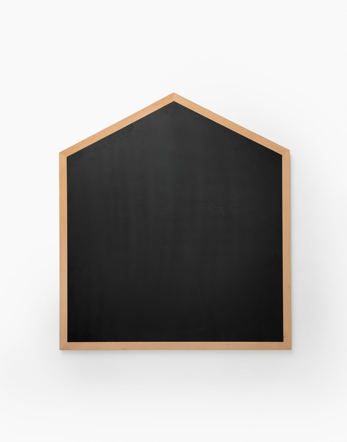 The Oversized Chalkboard features a blank black surface and a light wooden frame shaped like a house, set against a white background—ideal as a creative outlet in any kids room.