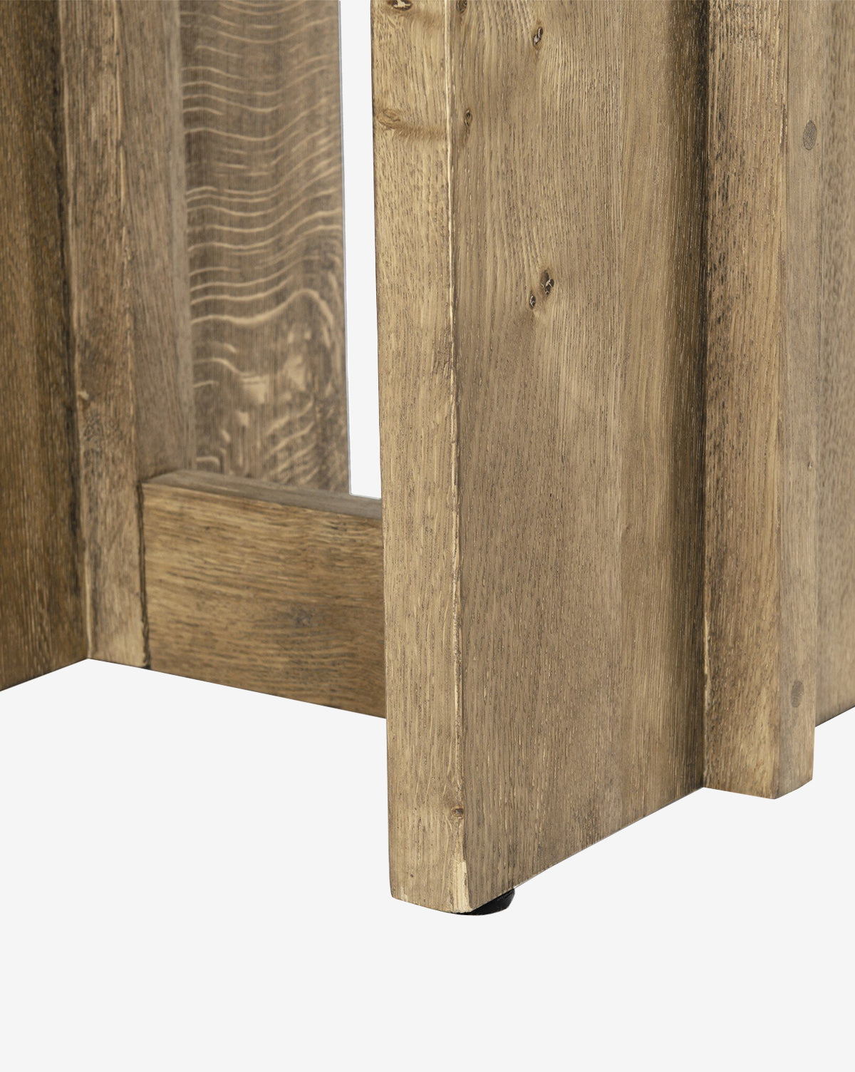 Close-up of the Ovitt Side Tables corner, highlighting its natural wood grain, visible knots, and light brown rustic finish, by McGee & Co.