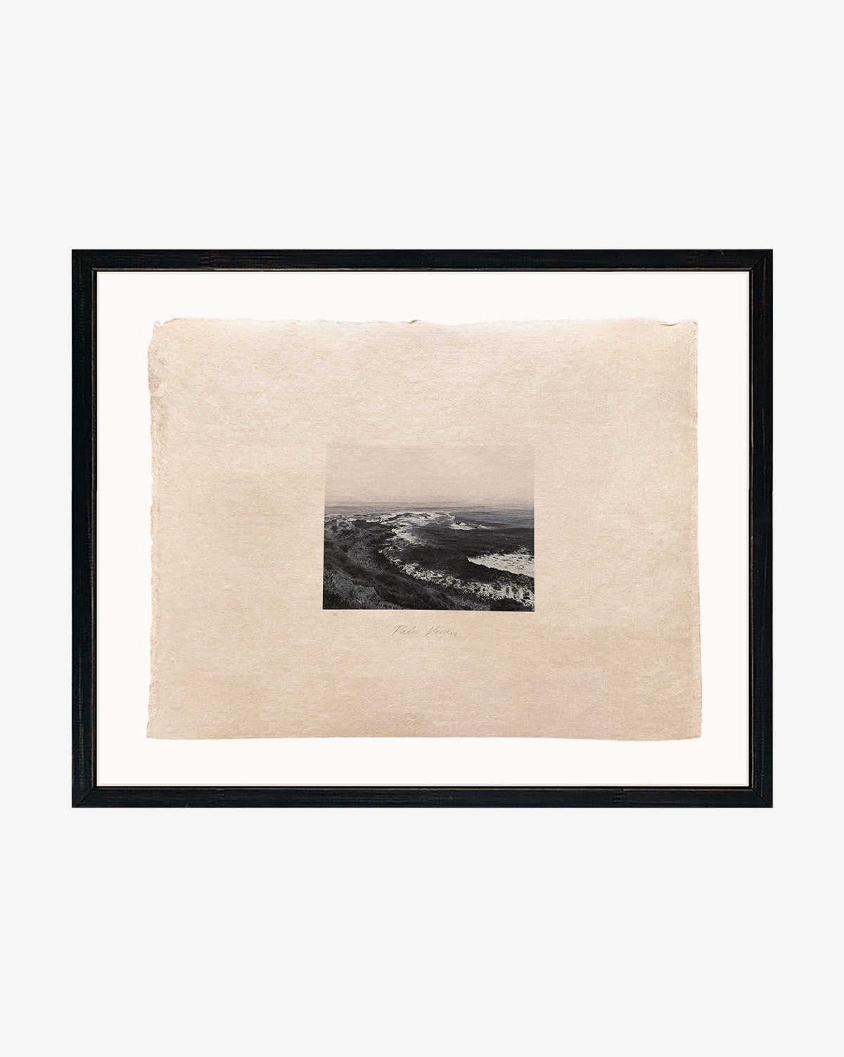 Palos Verdes: A museum-quality framed art piece featuring a small black and white ocean photograph, elegantly centered on Japanese handmade paper with rough edges, set in a simple black frame.
