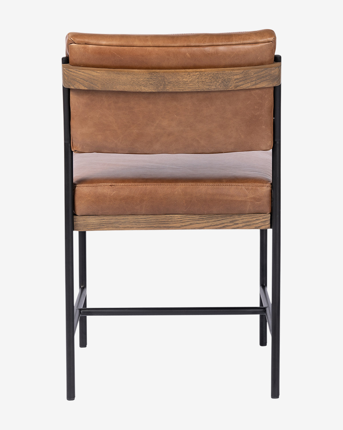 The Pascal Dining Chair showcases a brown leather seat, wooden frame, and black steel and wood legs, presented from the back against a white backdrop—an ideal addition to any dining table, by McGee & Co.