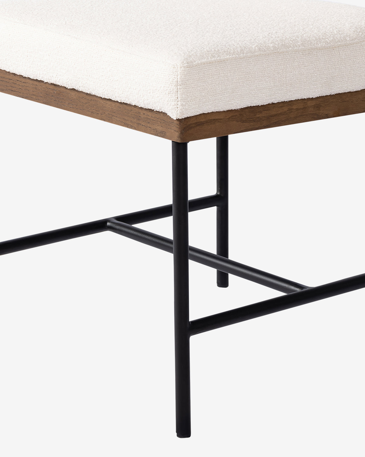 The Pascal Dining Chair features a cushioned white seat, a sleek steel and wood frame, and black metal legs in a simple geometric design, set against a plain white background by McGee & Co.