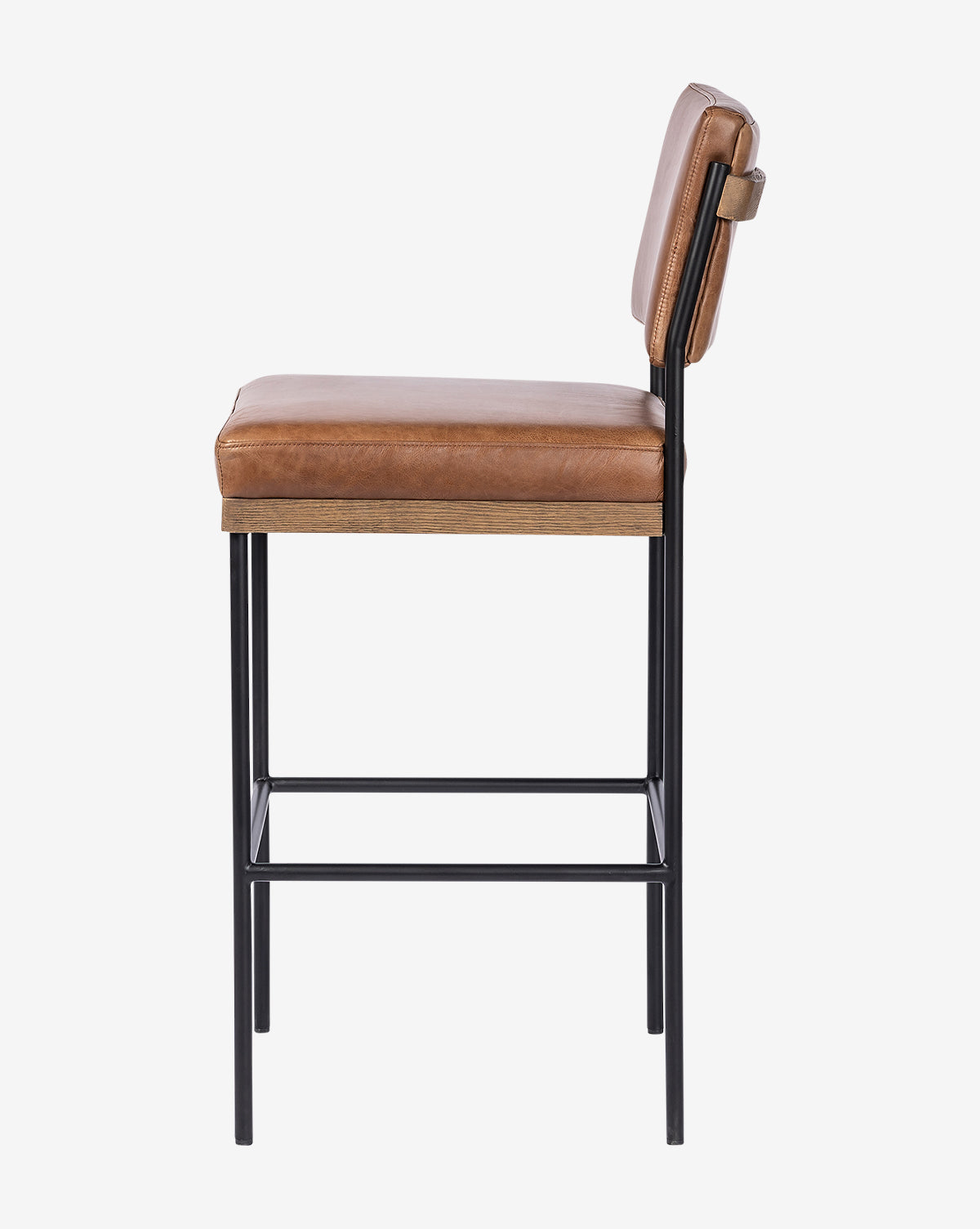 A side view of the Pascal Stool shows its tan leather cushioned seat and backrest, supported by a black iron frame and legs, set against a plain white background by McGee & Co.