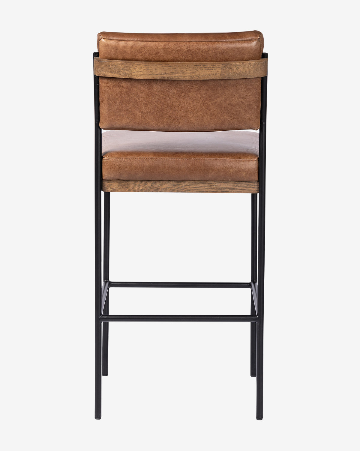 The Pascal Stool features a brown leather padded seat and backrest, set on a black iron frame with wooden accents, shown from the back against a white background by McGee & Co.