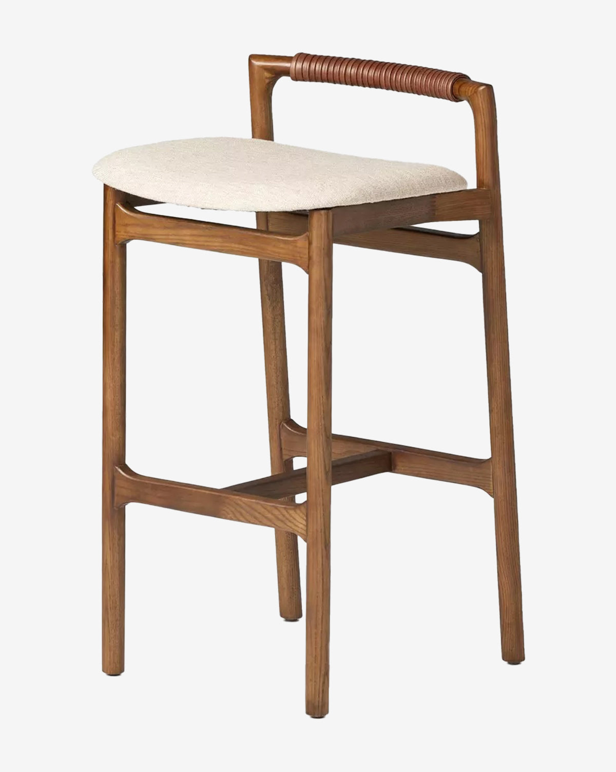 The Four Hands Patrin Stool showcases a modern ash wood frame, performance-upholstered seat, low curved backrest, and woven leather top rail, blending clean lines and minimalist design for a contemporary look by McGee & Co.