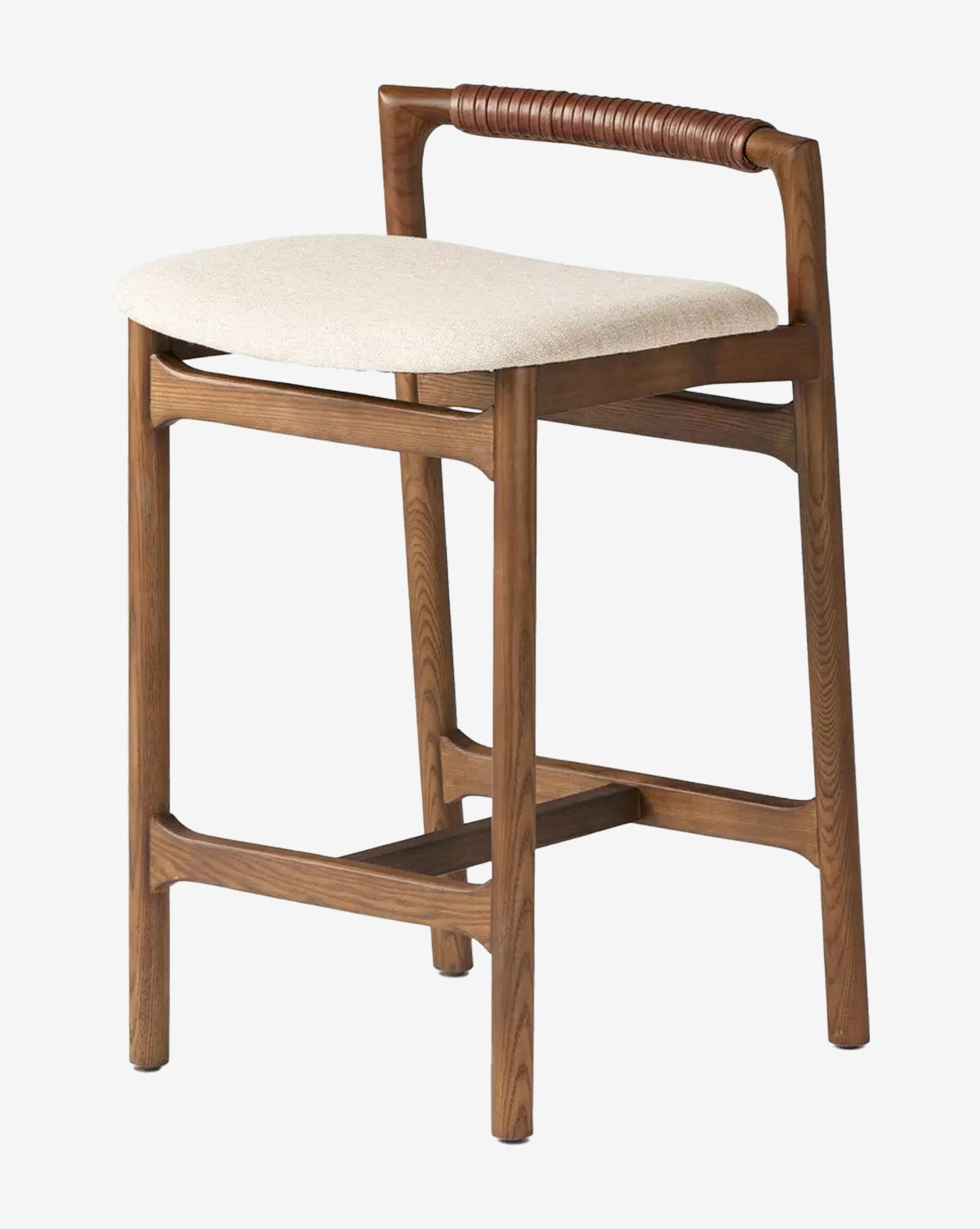 The Four Hands Patrin Stool offers a light beige performance-upholstered seat, a brown cord-wrapped low curved backrest, and an ash wood frame with angled legs and horizontal supports. McGee & Co.