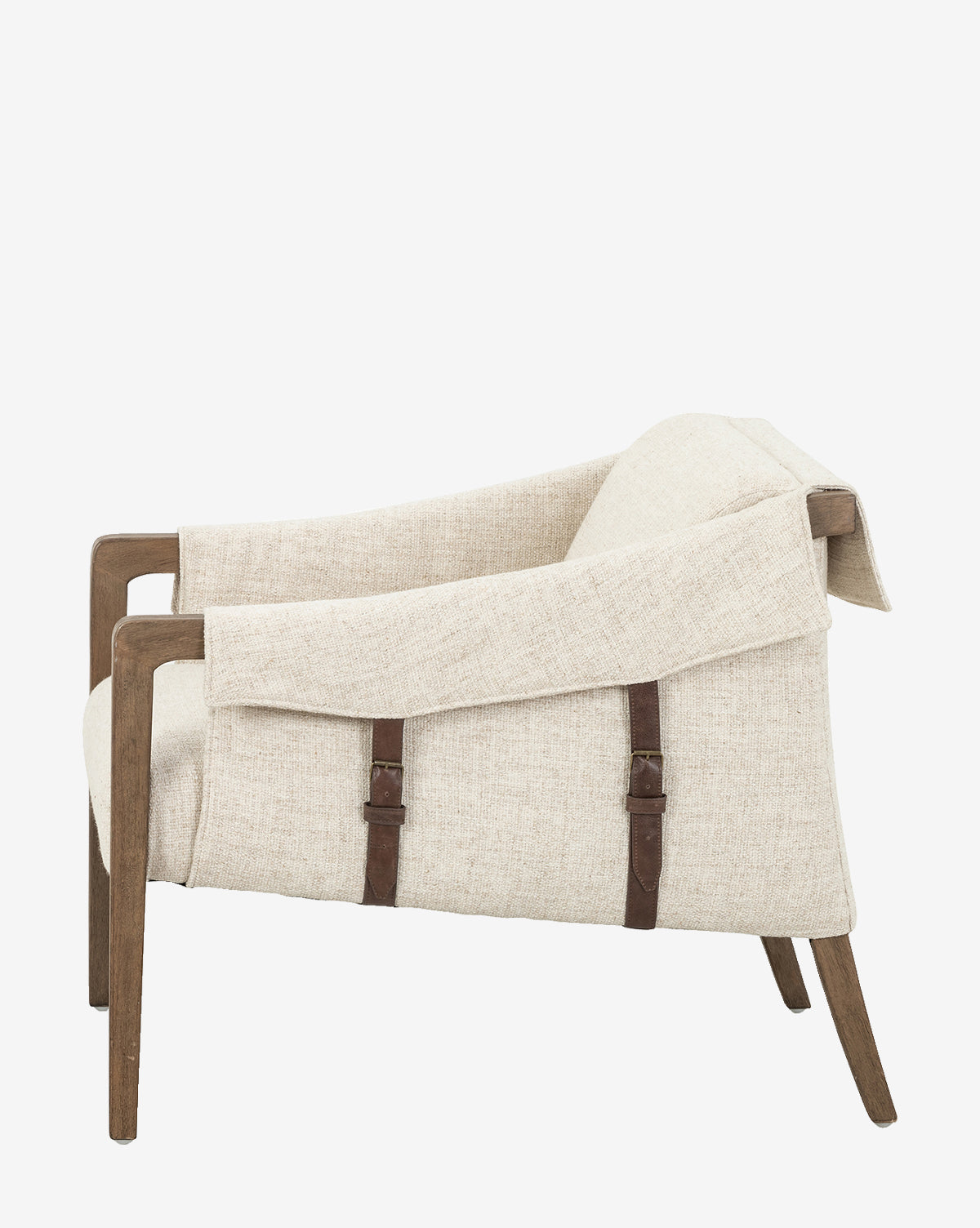 Side view of the Payson Leather Chair with a beige performance fabric seat, wooden frame, and top-grain leather straps holding the upholstery; shown against a plain white background.