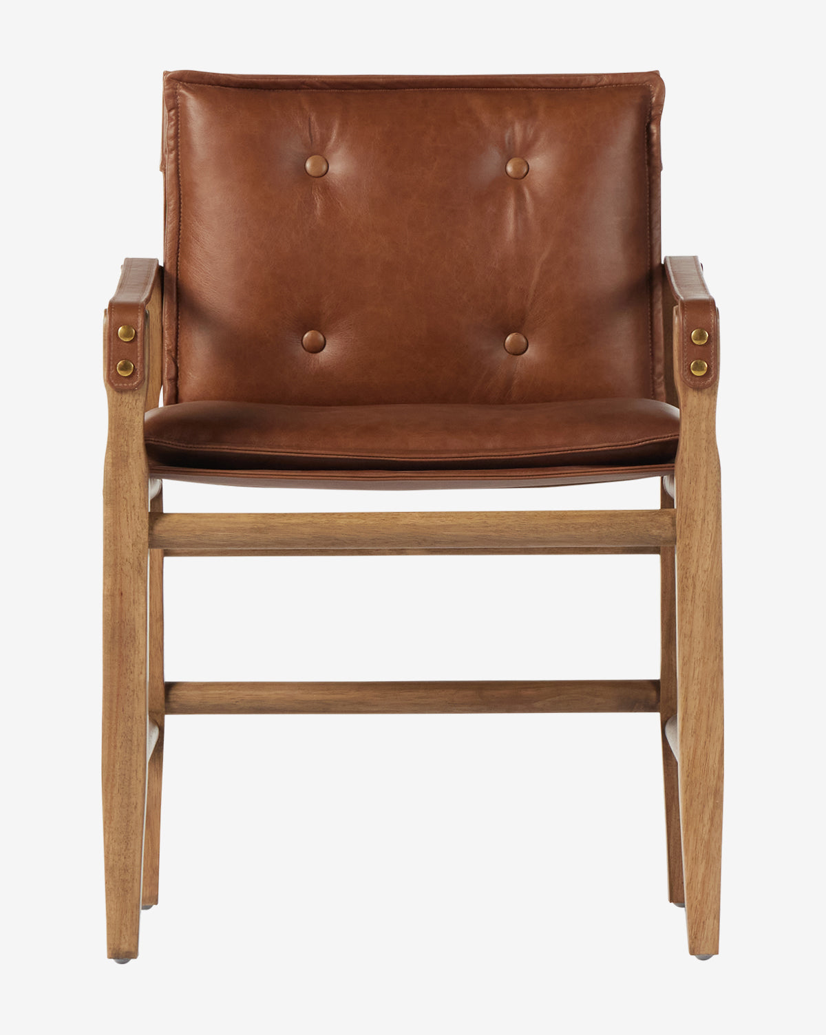 The Pederson Dining Armchair features a honey wood frame, top-grain brown leather seat with button tufting, and brass hardware on the armrests for mid-century modern style, by McGee & Co.