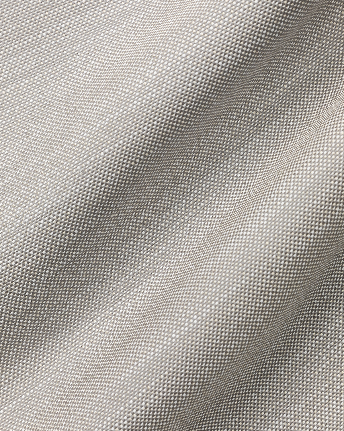 Close-up of the Perennials Upholstery Swatch in light gray, showing its fine, tightly woven pattern and soft folds; crafted from solution-dyed acrylic for lasting durability and timeless style.