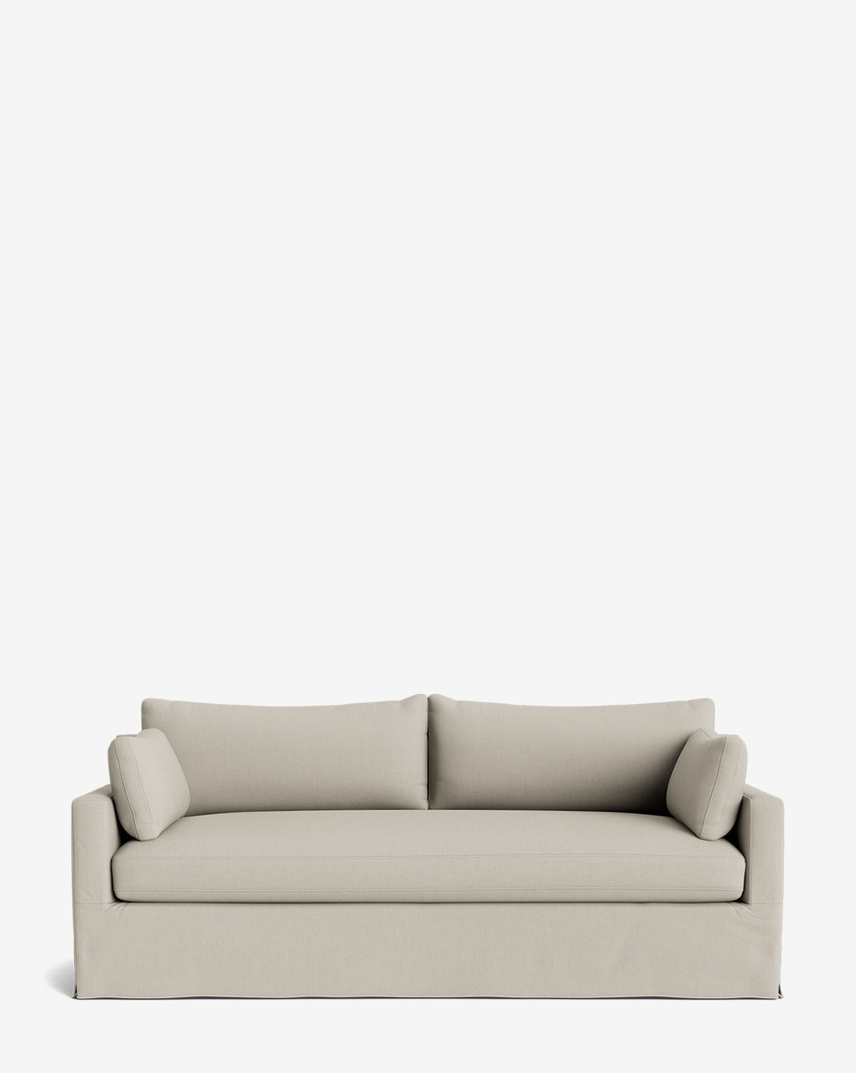 The Peterson Classic Slipcover Sofa (75-100) showcases a modern beige design with two seat and back cushions, two bolster pillows, and feather blend cushioning for enhanced comfort, set against a plain white background by McGee & Co.