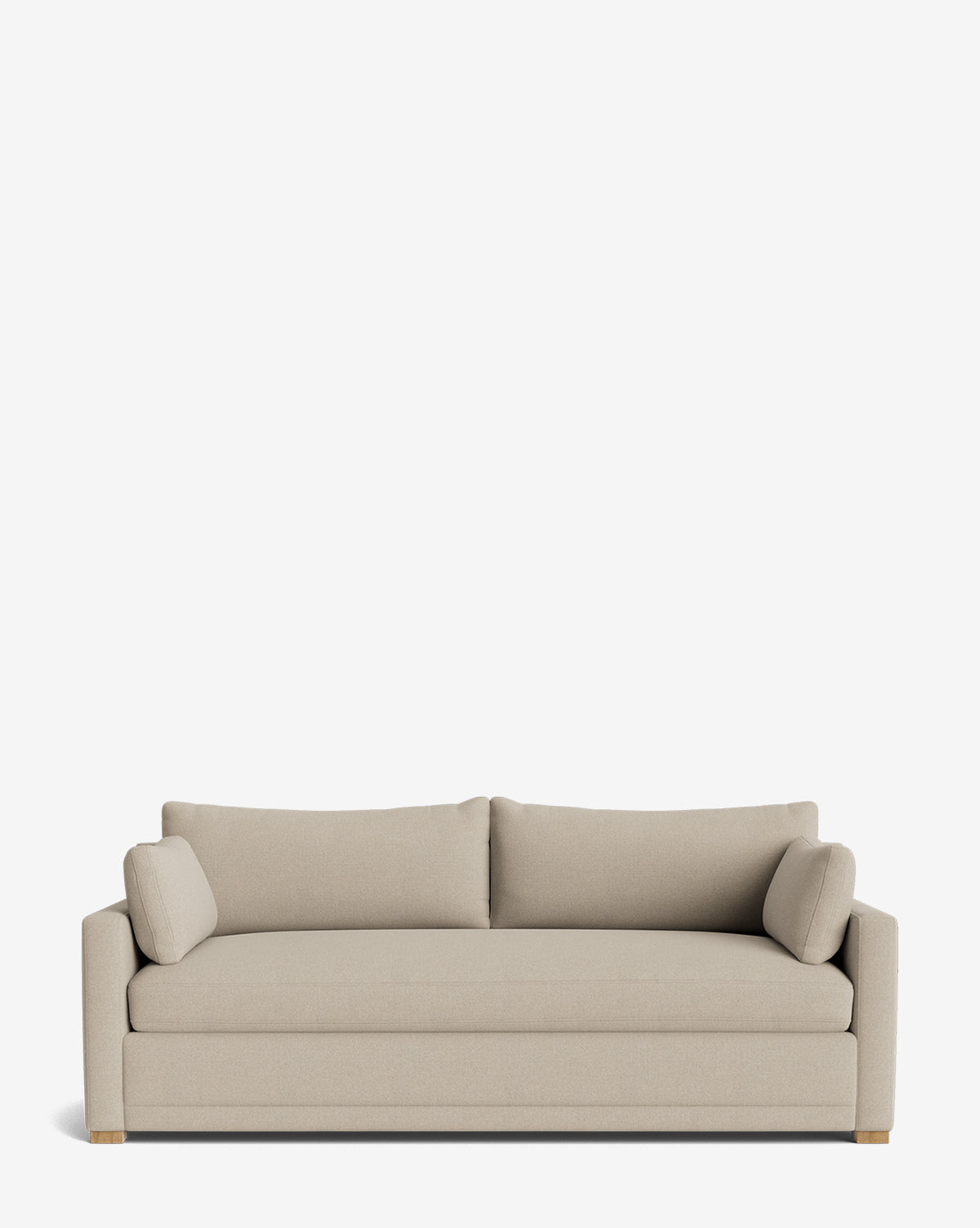 The Peterson Classic Upholstered Sofa (75 - 100) is a modern beige sofa featuring two plush seat cushions, two backrest cushions, and two cylindrical side pillows, shown against a plain white background by McGee & Co.