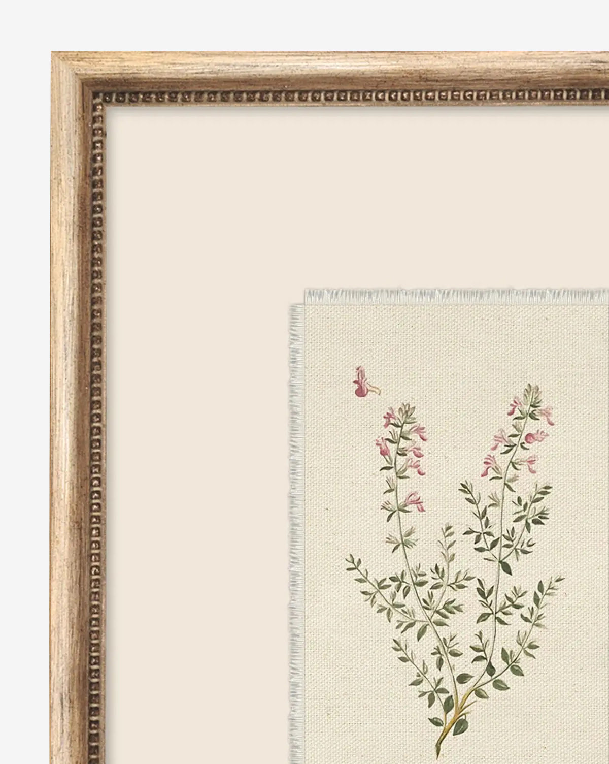 Petite Floral VII is a framed wall art featuring a botanical illustration of green leafy plants, small pink flowers, and a pink butterfly on a light fabric background in a vintage-inspired wood frame, by McGee & Co.