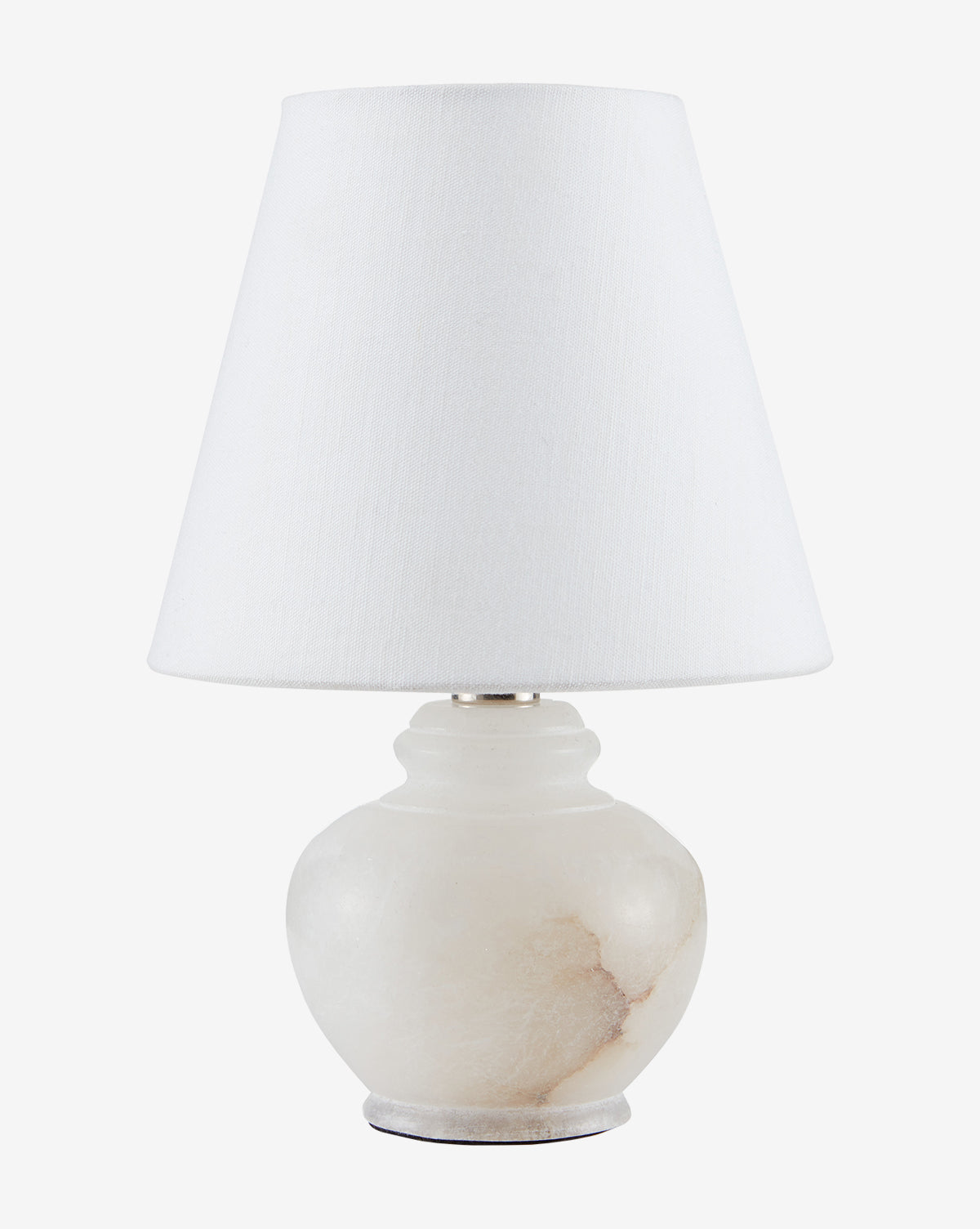 The Piccolo Table Lamp has a round alabaster base with brown veining and a white cone-shaped fabric shade, shown against a plain white background by McGee & Co.