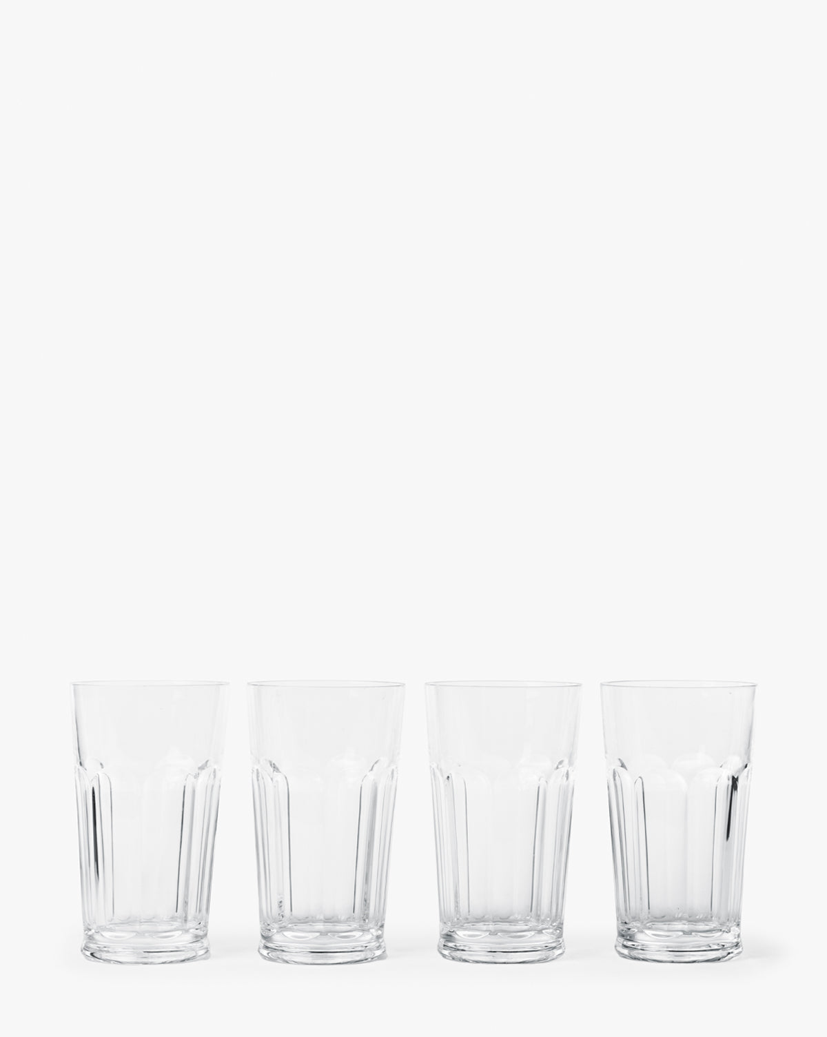 Four Pickwick Acrylic Highball Glasses (Set of 4) are arranged in a row on a plain white background, ideal for outdoor table settings or as durable drinkware for any occasion, by McGee & Co.