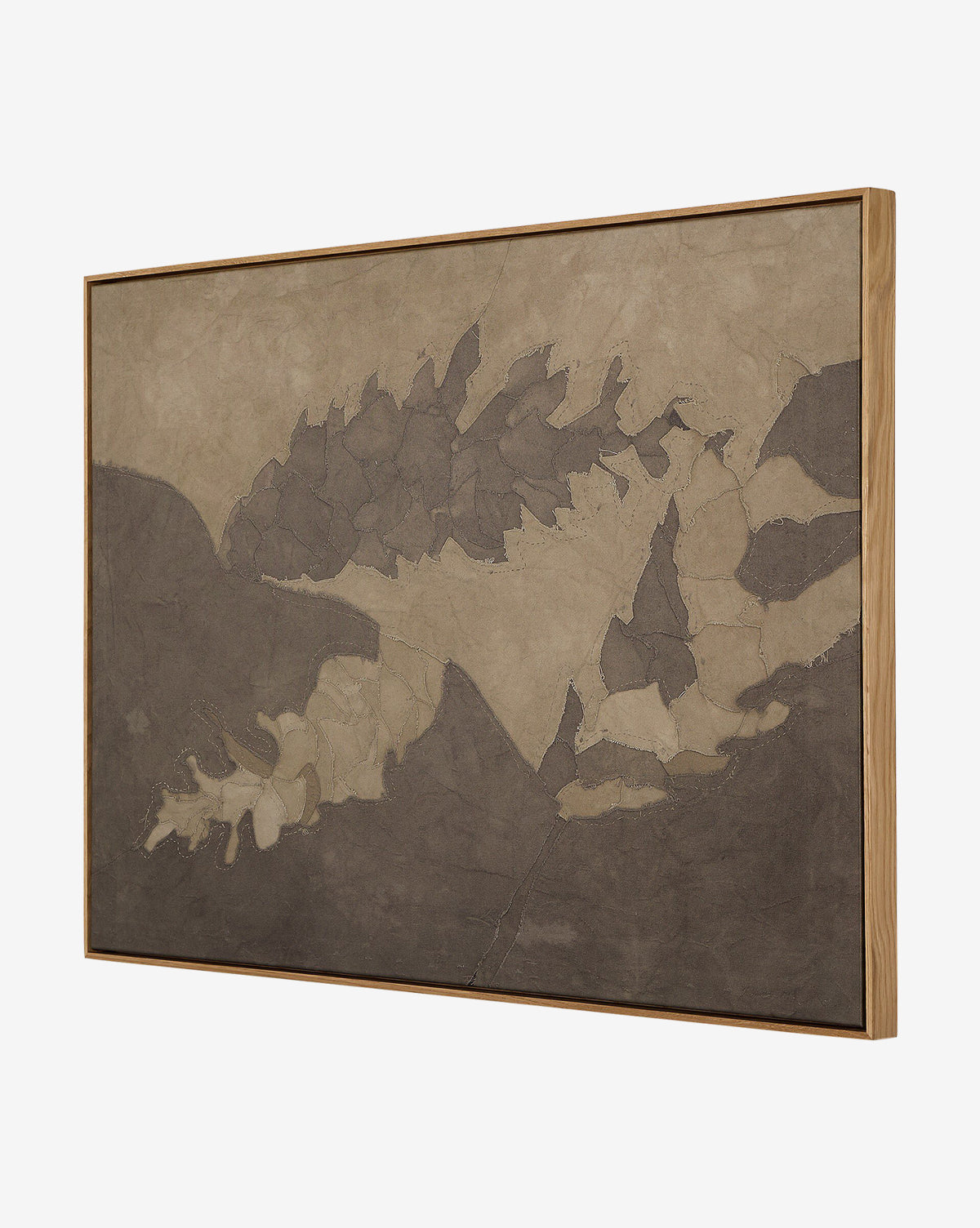 Pinecorn III by Kimmy Quillin is a framed abstract artwork with textured, earthy-toned patterns resembling overlapping organic shapes, displayed at an angle against a plain background, by McGee & Co.