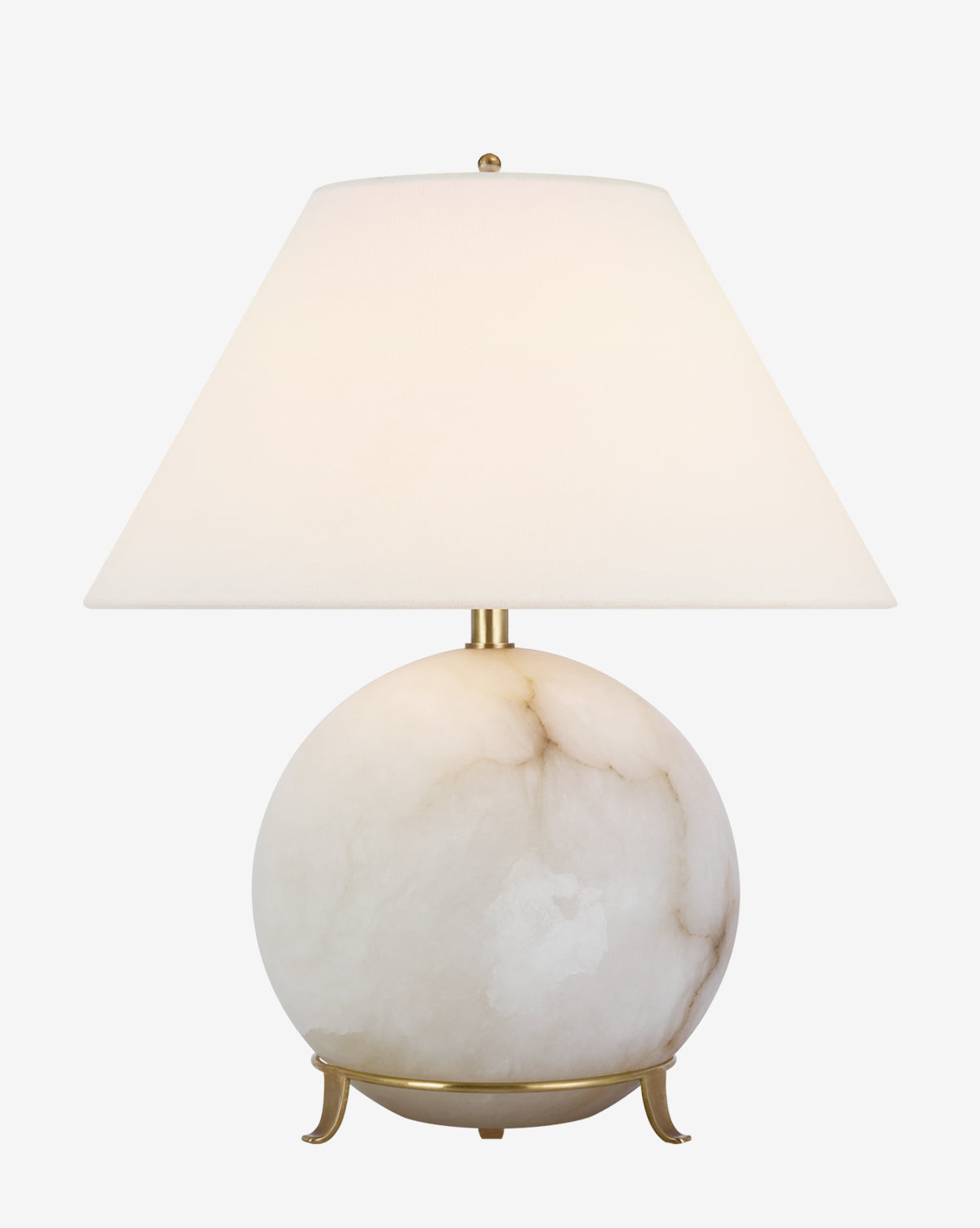 The Price Table Lamp features a round alabaster base with subtle gray veining, a wide linen shade, and a small gold stand with curved feet, by McGee & Co.