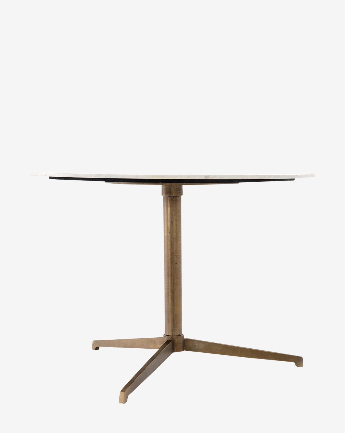 The Priya Dining Table features a round, thin white marble tabletop and a central metal pedestal with three angled legs, shown against a plain white background by McGee & Co.