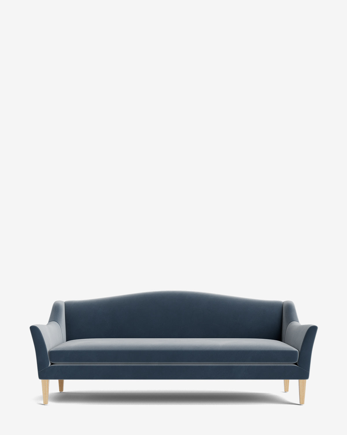 The Prudence Sofa 78 is a modern dark blue velvet piece with light wooden legs, a curved backrest, and subtly flared armrests—an elegant take on the classic silhouette, crafted with high-quality fabric and set against a plain white background, by McGee & Co.