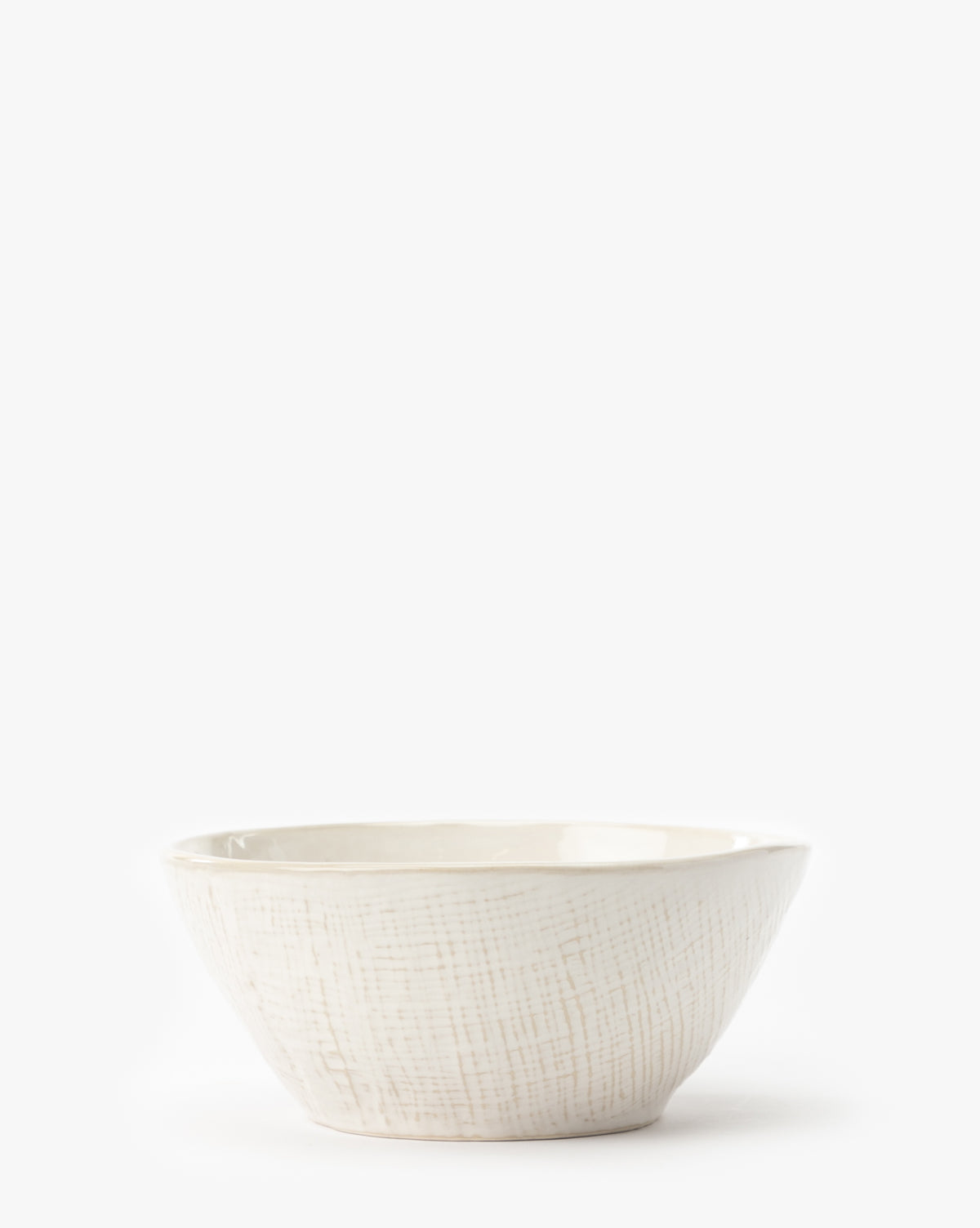 The Radlee Bowl, a small off-white artisan piece with a subtle textured pattern, is centered on a plain white background by McGee & Co.