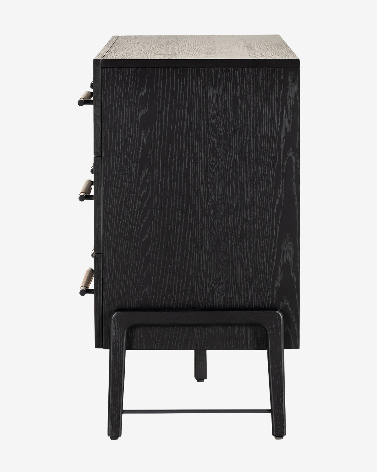 Side view of the Ralston 6-Drawer Dresser in black oak, showcasing visible wood grain, elevated legs, and leather drawer pulls arranged along the left edge.