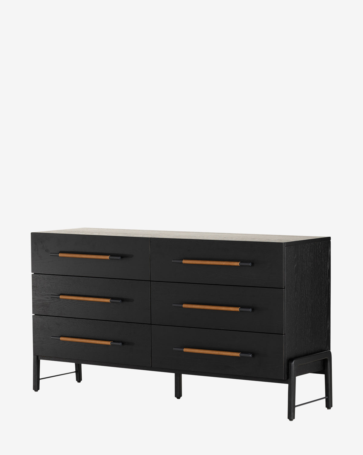 The Ralston 6-Drawer Dresser is a sleek, black dresser with six drawers accented by long leather pulls and supported by short, open legs for a modern minimalist look.