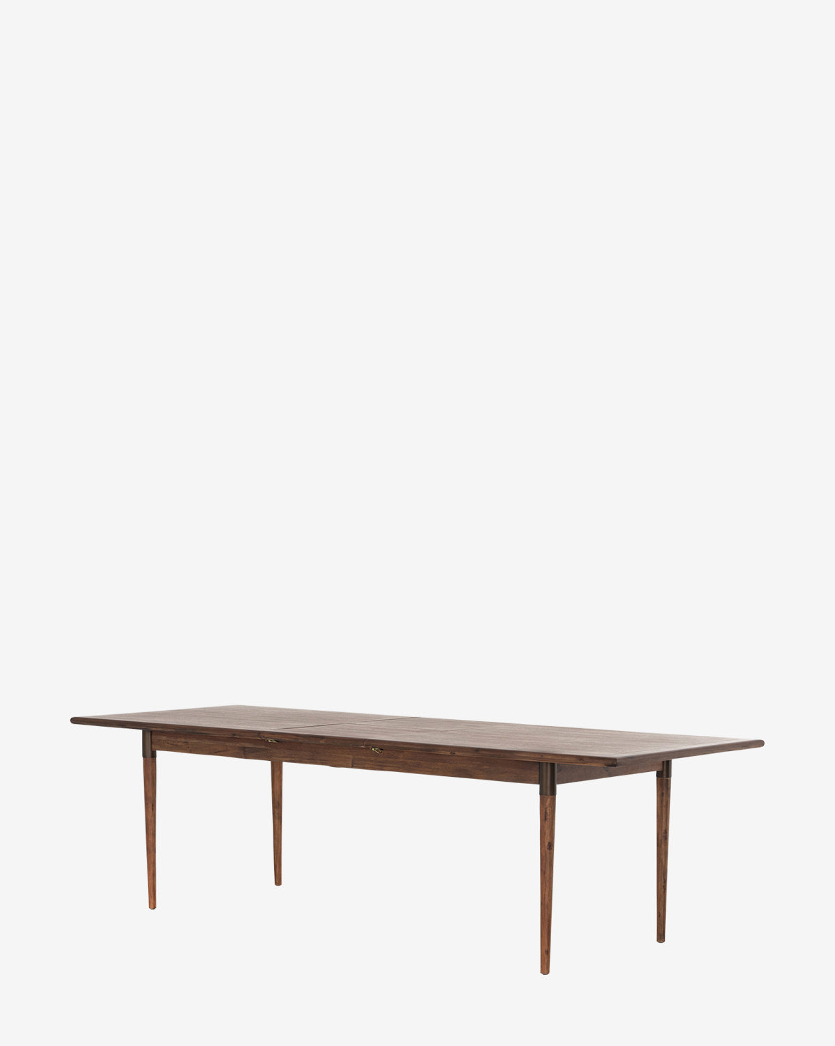 The Redmond Extension Dining Table features a long, rectangular wooden top with a dark finish and four slender, tapered legs inspired by Scandinavian design, shown against a plain white background by McGee & Co.