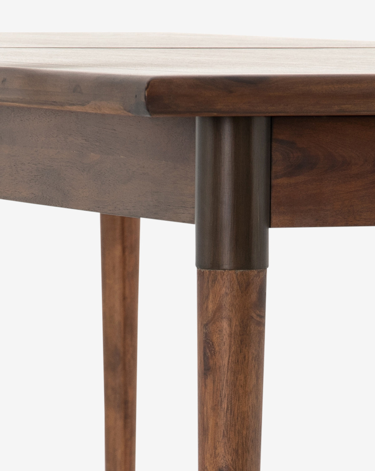 Close-up of the Redmond Extension Dining Table corner, featuring smooth rounded edges and cylindrical legs with metal sleeves, highlighting Scandinavian craftsmanship ideal for any dining space, by McGee & Co.