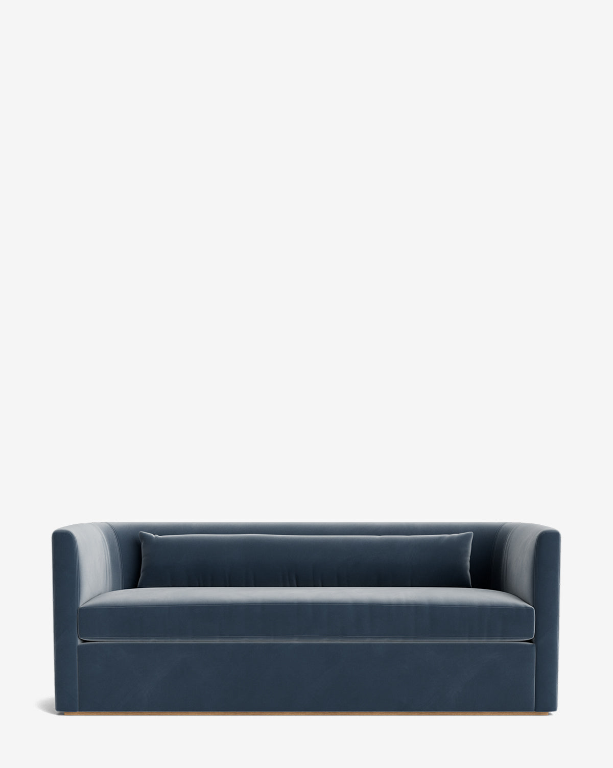 The Reese Sofa (84-96) showcases modern deep blue velvet upholstery, a boxy silhouette, low back, straight arms, handcrafted alder wood base, and includes matching lumbar and down-wrapped cushions, by McGee & Co. Shown on a plain white background.
