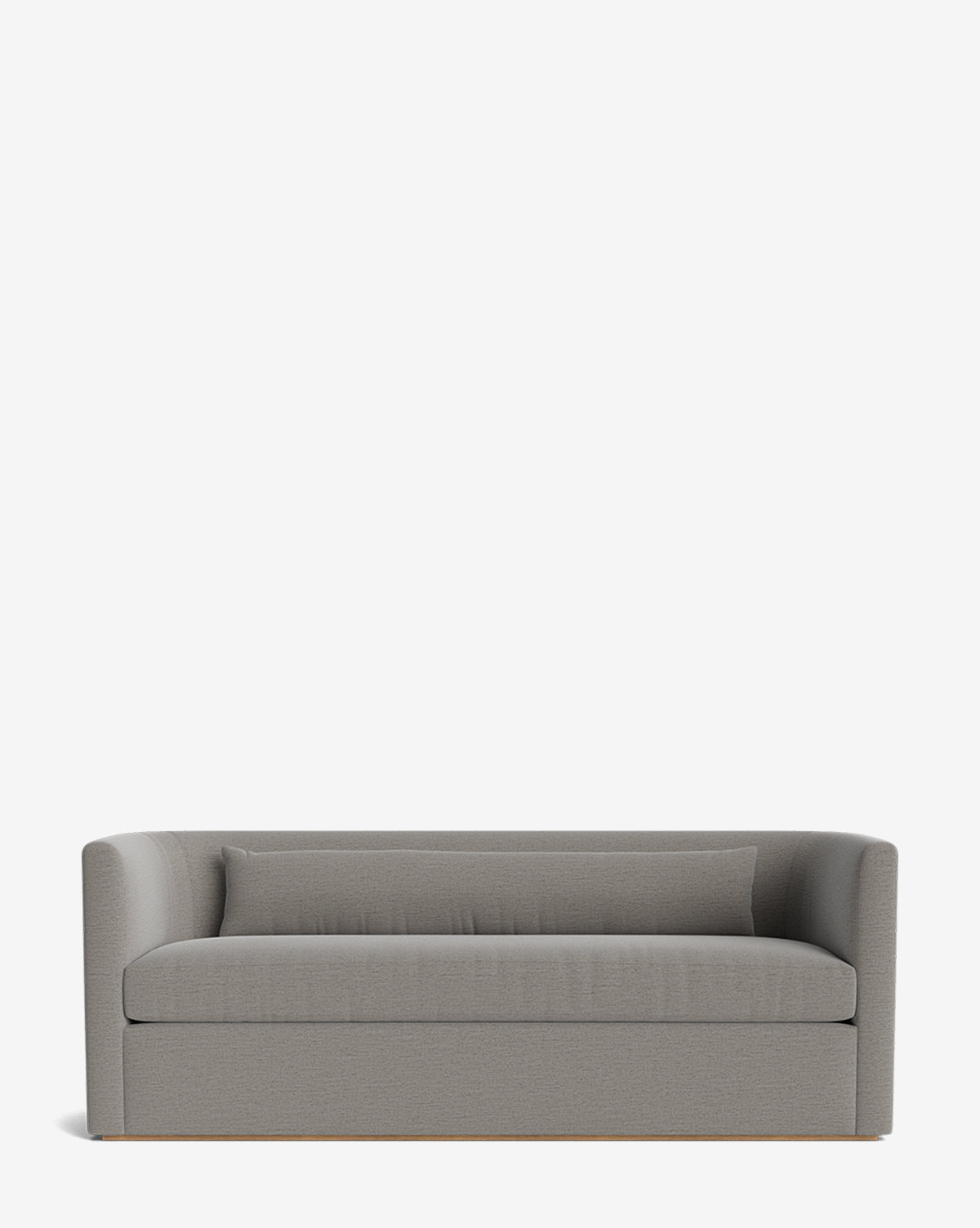The Reese Sofa (84-96) showcases modern gray upholstery, a single long down-wrapped cushion, matching lumbar pillow, curved armrests, and a low backrest against a plain white background by McGee & Co.