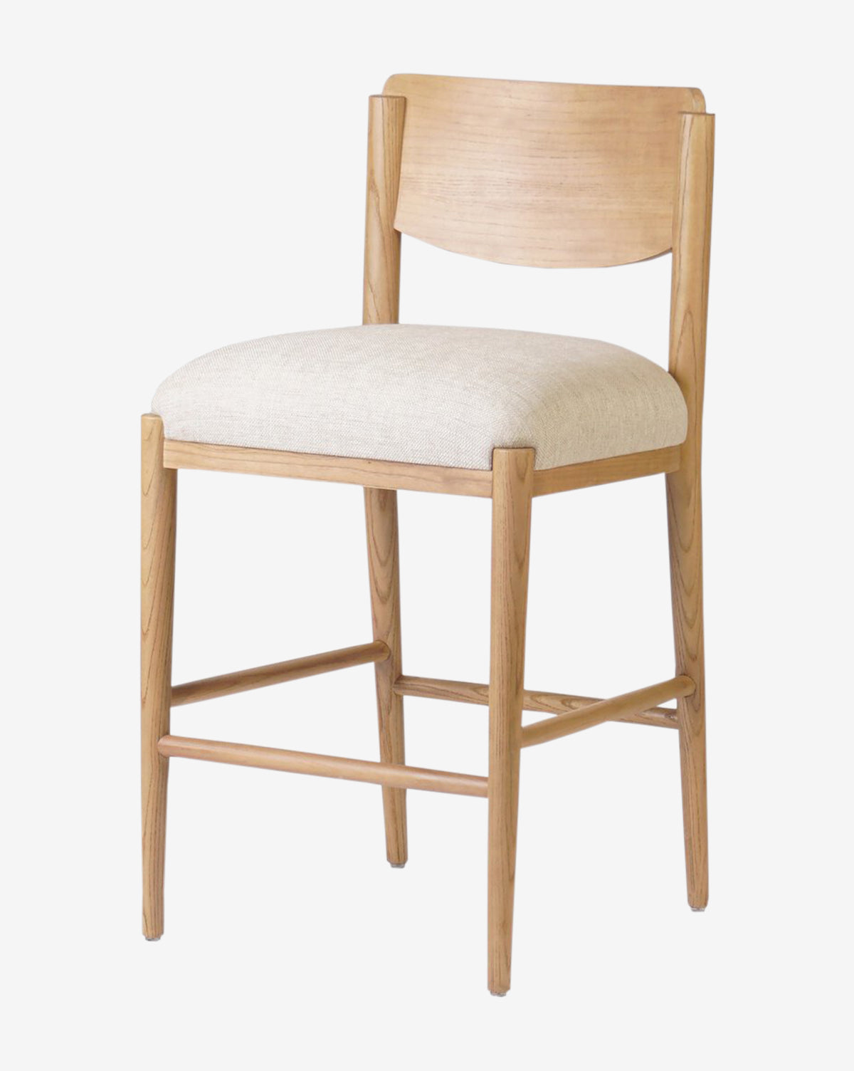 The Reverie Stool by Four Hands features a light natural wood finish, curved backrest, cushioned beige seat, and minimalist straight legs for a modern look. McGee & Co.