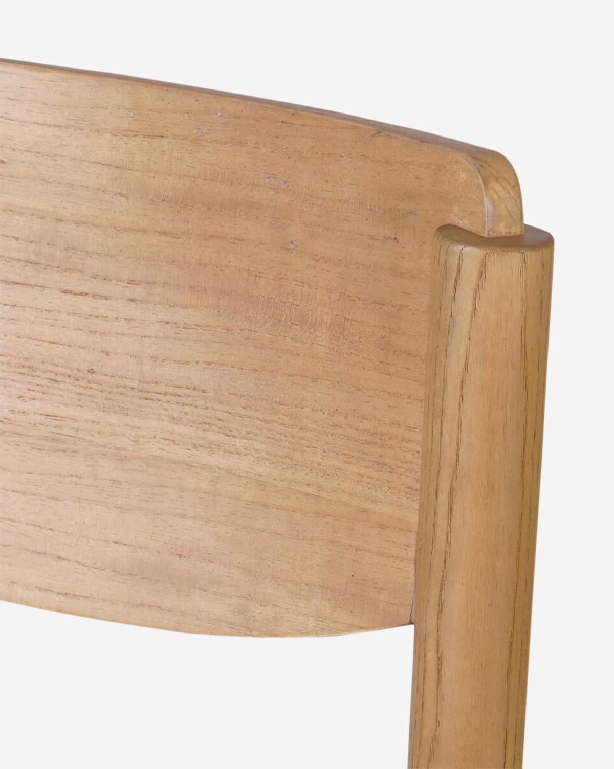 Certainly! Here’s your revised sentence with the exact string McGee & Co. blended at the end: Close-up of the Four Hands Reverie Stool backrest, made from natural wood with smooth, curved edges and subtle grain—an ideal accent for any kitchen. McGee & Co.