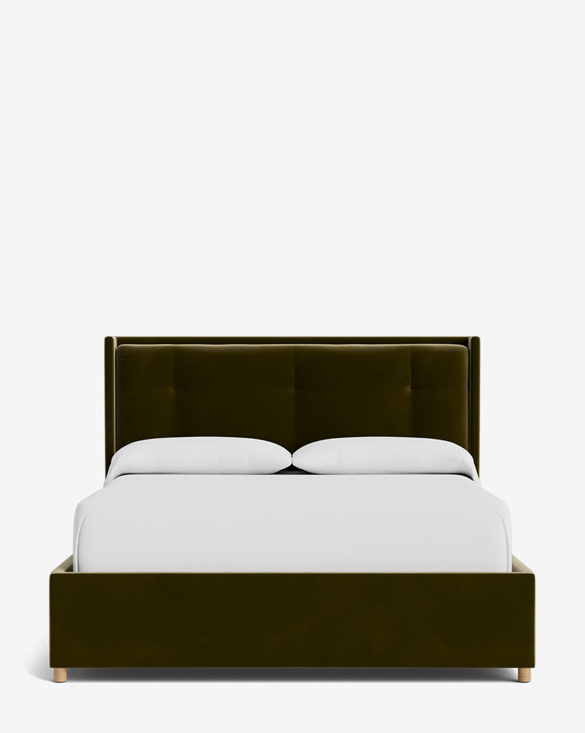 The Ria Bed Low Headboard features modern, dark green upholstery with a tall tufted headboard and wooden legs, styled with white bedding and two pillows on a plain white background by McGee & Co.
