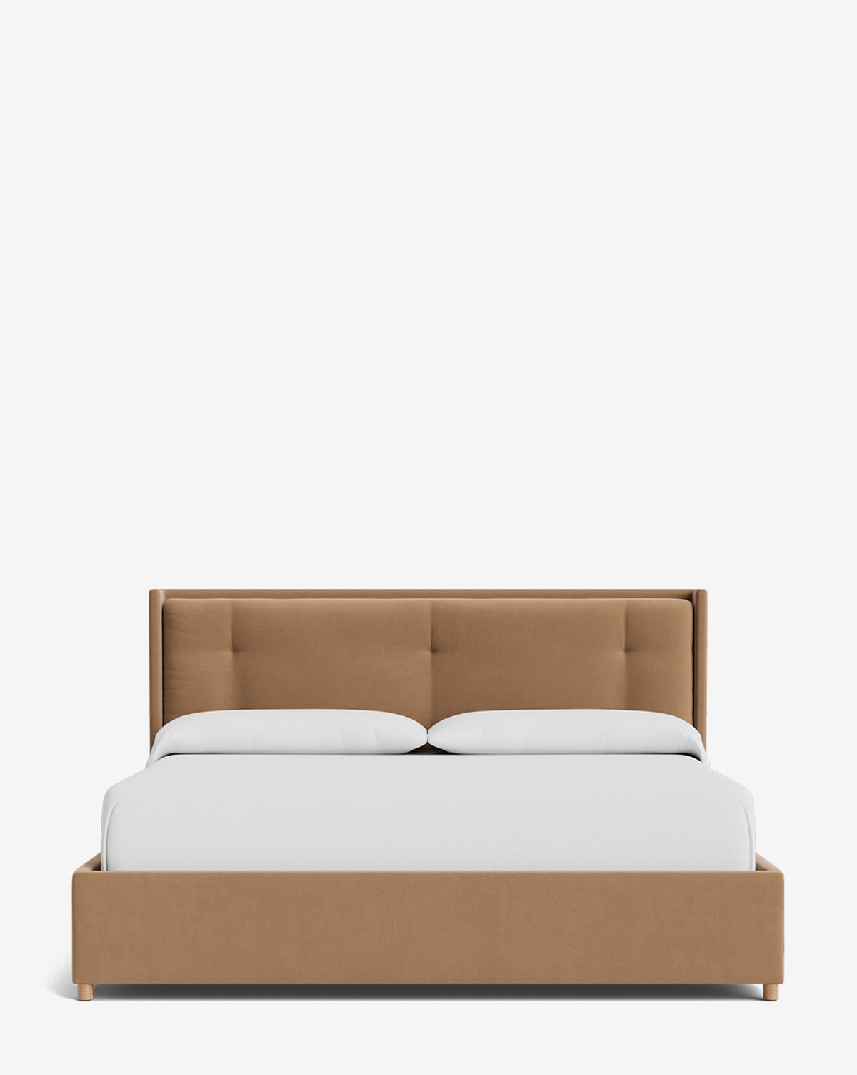 The Ria Bed Low Headboard features tan upholstery with a tufted headboard, paired with white bedding and two pillows, displayed against a plain white background by McGee & Co.