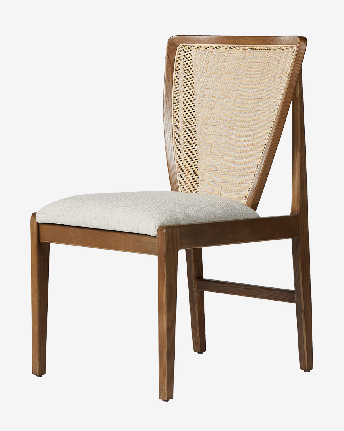 The Rogan Dining Chair features a cream performance fabric seat, woven cane back, clean lines, and an angled back for a modern, contemporary style, by McGee & Co.