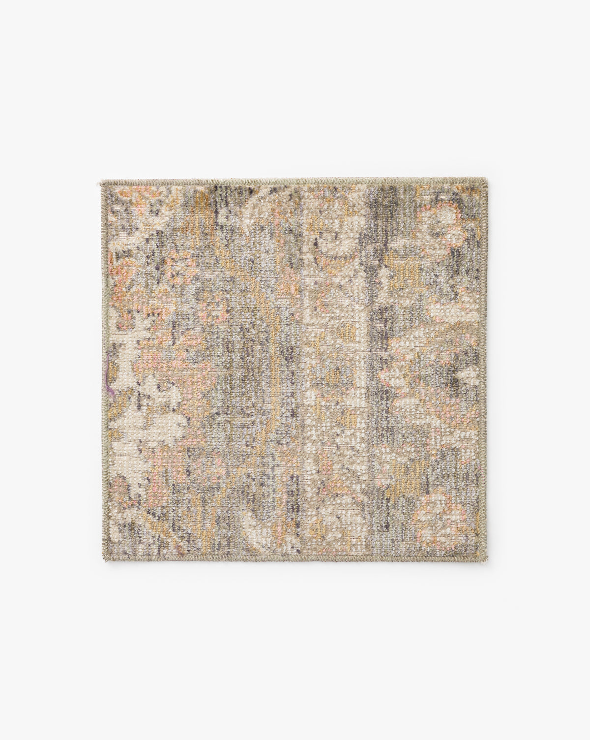 The Rosemarie Collection No. 1 Sage Swatch is a square, durable low-pile rug sample with a distressed vintage-style pattern in muted beige, gray, and pale peach on white, offering a subtly worn look for vintage modern appeal, by McGee & Co.