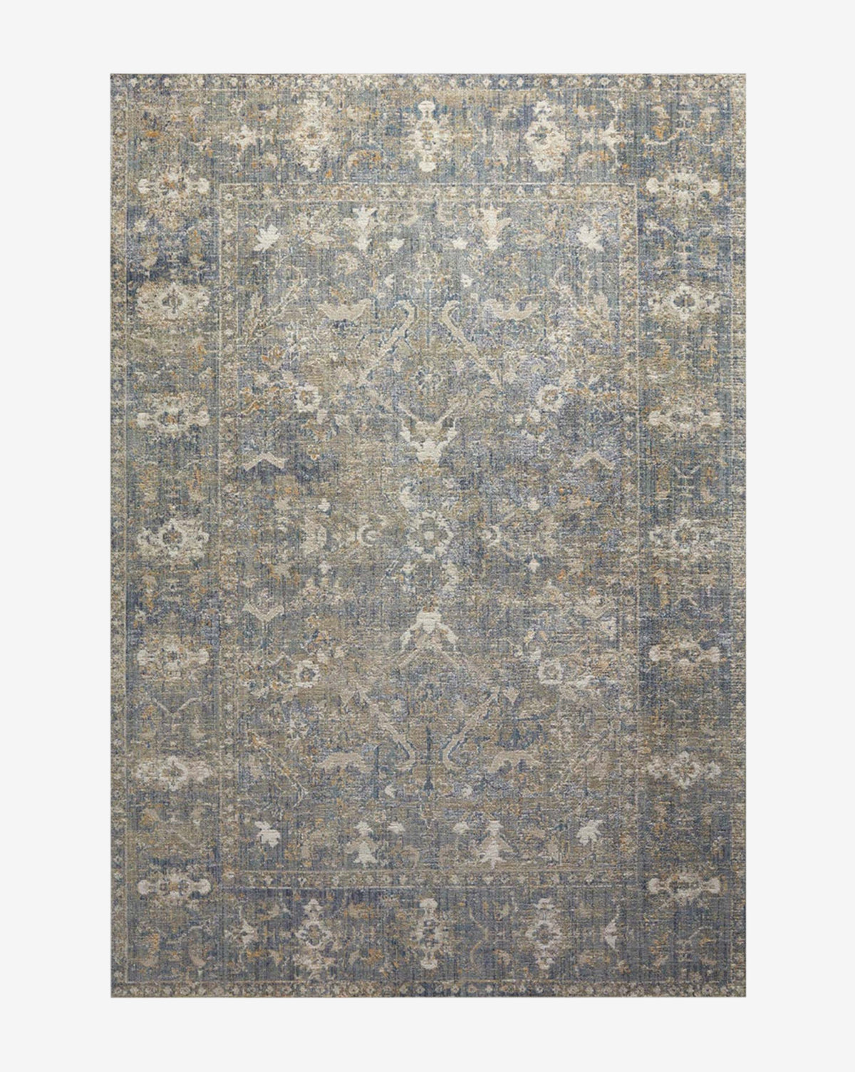 The Rosemarie Collection No. 3 is a vintage low pile rug with a faded blue and beige floral pattern and decorative border, offering a distressed, timeless look, by McGee & Co.
