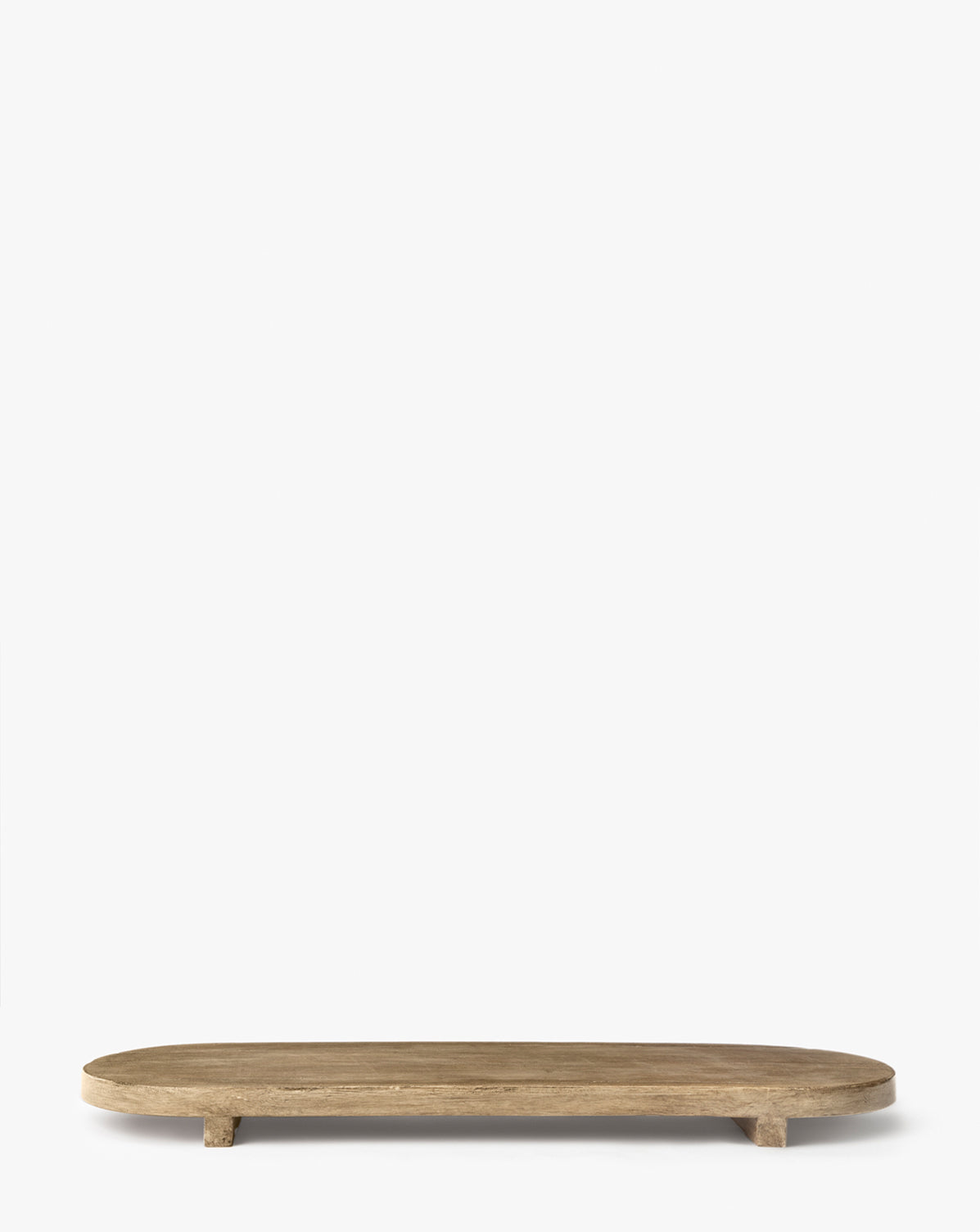 The Rounded Edge Bath Caddy is an oval-shaped wooden tray with short legs and an organic texture, displayed against a plain white background.