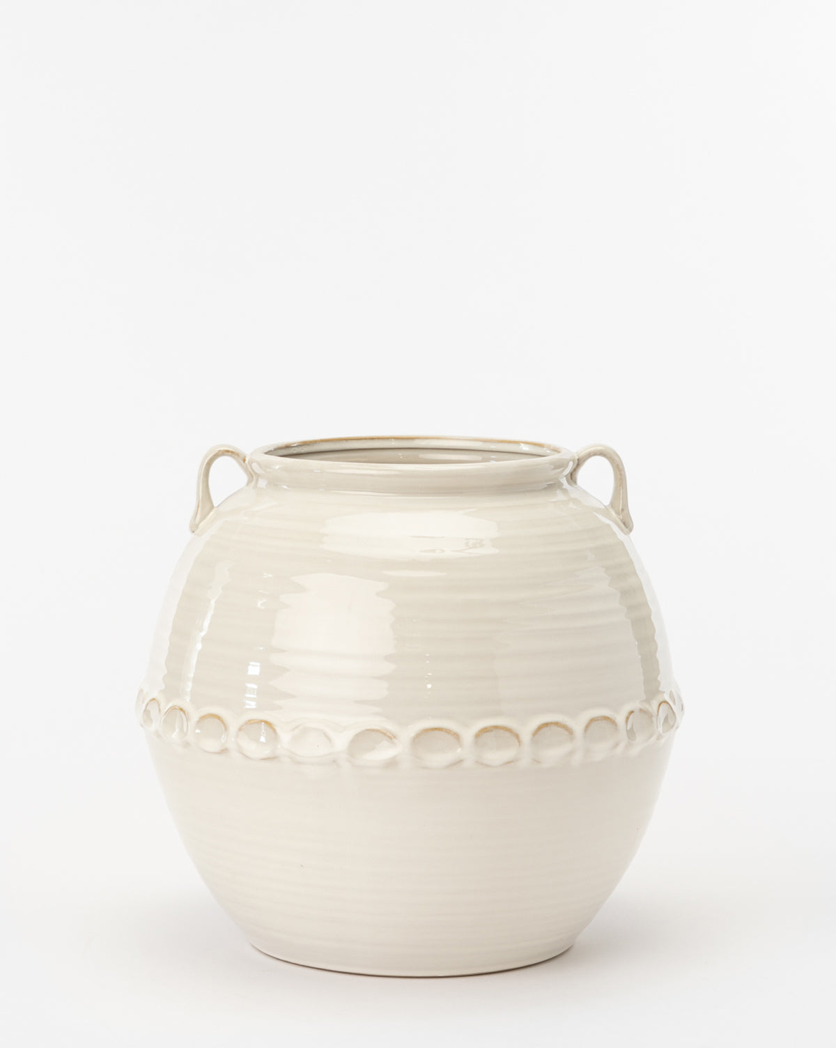 The Rounded White Vase features a rounded white silhouette, two small handles near the rim, and a raised ring pattern at its midsection. Displayed against a plain white background.