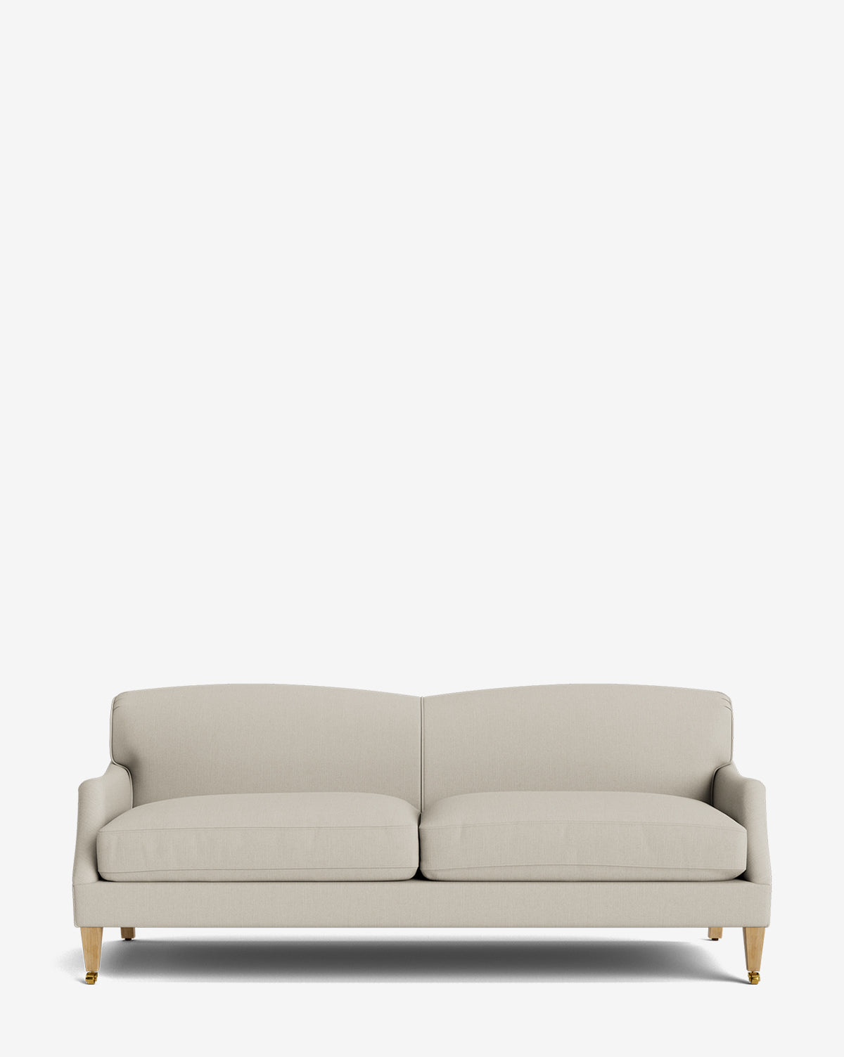 The Rowley Sofa 85 features two seat cushions, a low backrest, and wooden legs with gold accents on a plain white background; this customizable piece is ideal for contemporary interiors, by McGee & Co.