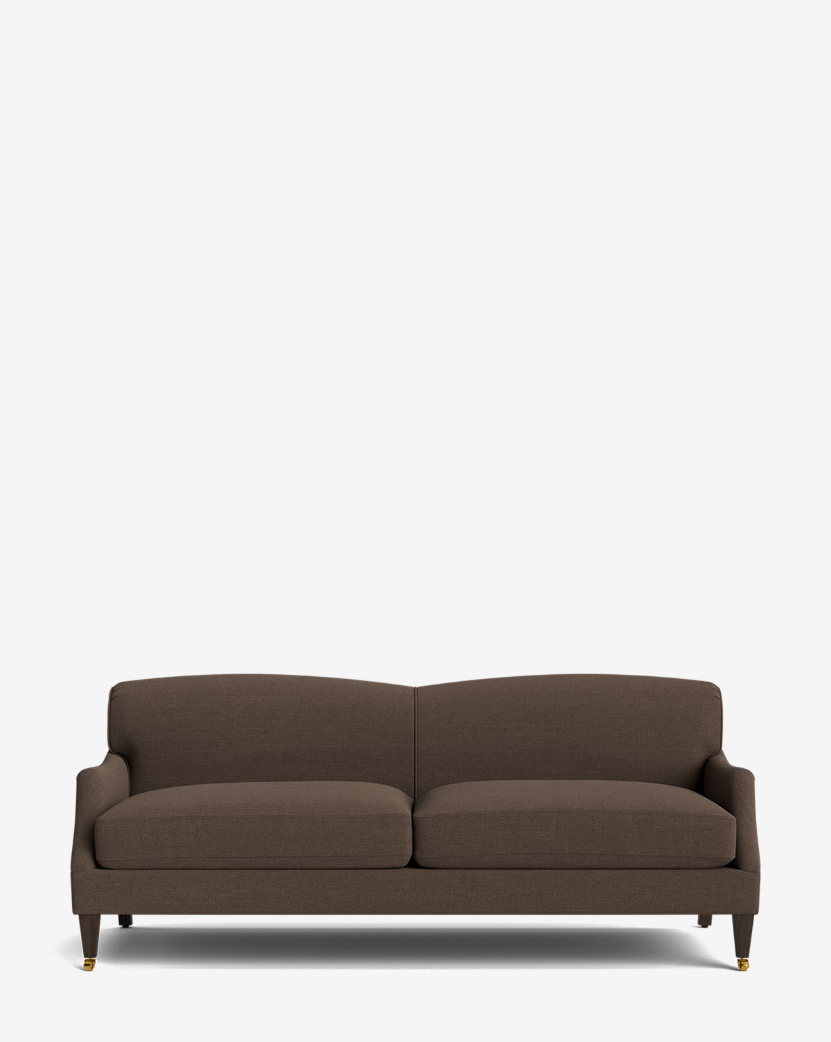 The Rowley Sofa 85 is a modern brown upholstered, hand-crafted sofa featuring two seat cushions, a low backrest, and wooden legs with small brass wheels, shown against a plain white background by McGee & Co.