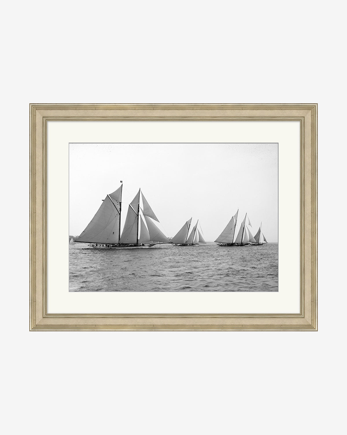 Sailing No. 3 is a black and white photo of sailboats racing, available as a gallery-quality giclee print in a light wood frame with a white mat.