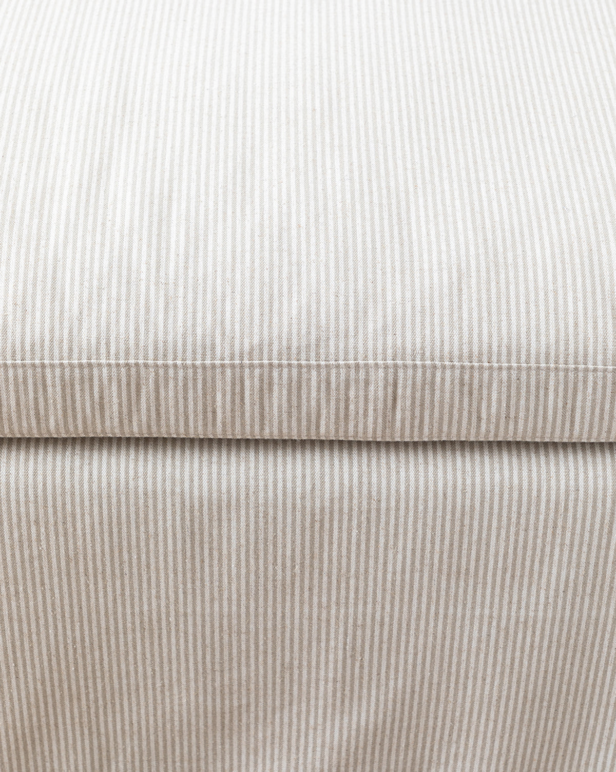 Close-up of light beige and white striped linen upholstery, highlighting the seam—part of the Scaletta Bench (Ready to Ship), by McGee & Co.