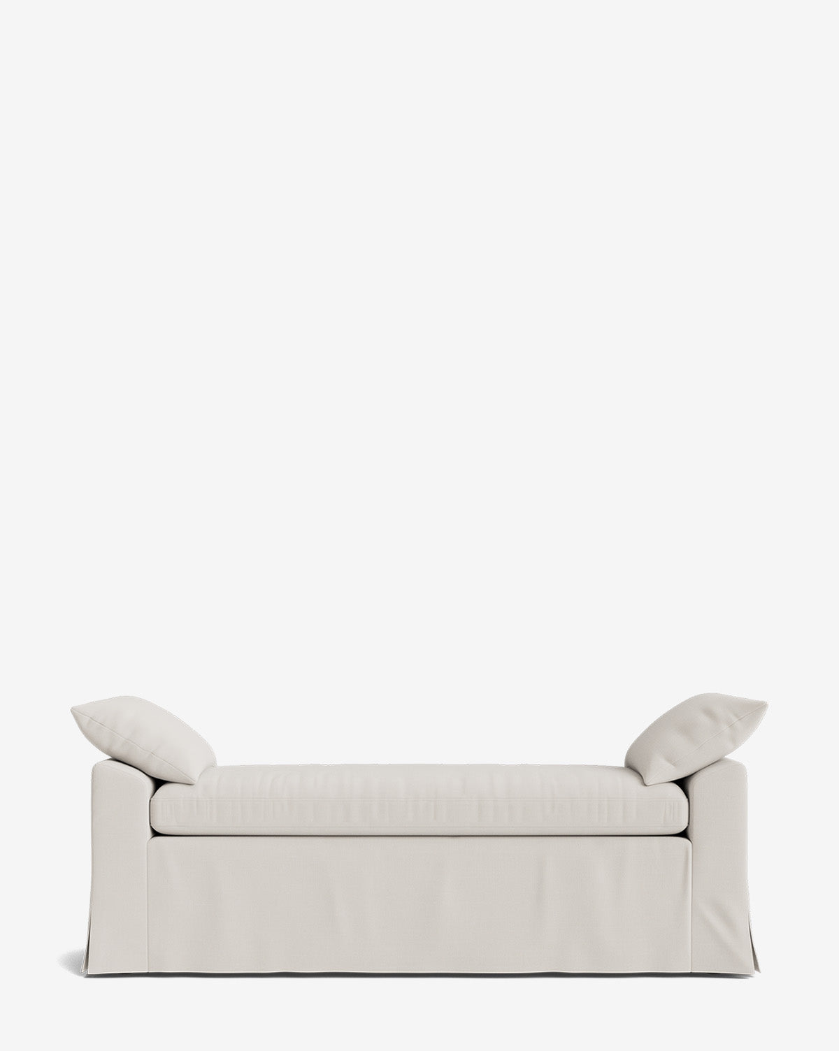 The Scaletta Bench is a modern, light beige upholstered bench featuring two matching pillows at each end and crafted in performance fabric with a sleek, minimalistic design and clean lines, by McGee & Co.