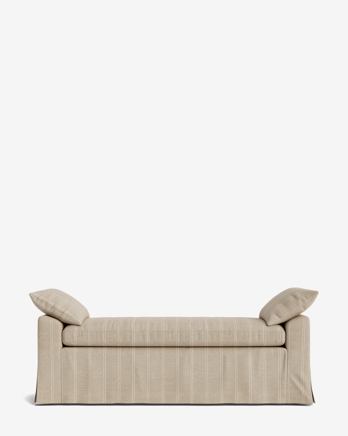The Scaletta Bench, upholstered in beige performance fabric with subtle vertical stripes, includes two matching end cushions and a tailored skirt over the legs, displayed against a plain white background by McGee & Co.